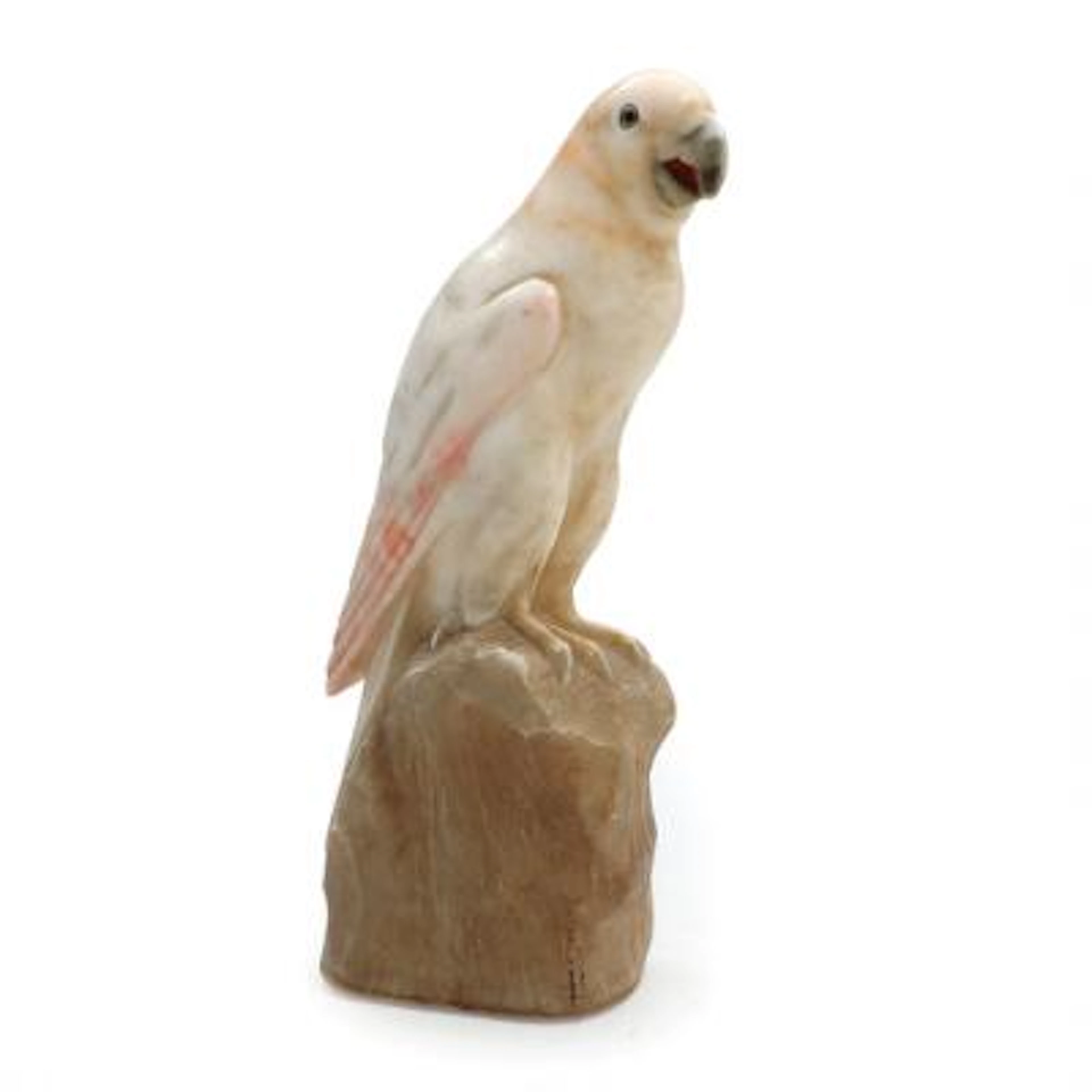 Figure of partially polished alabaster in the shape of a parrot. Circa