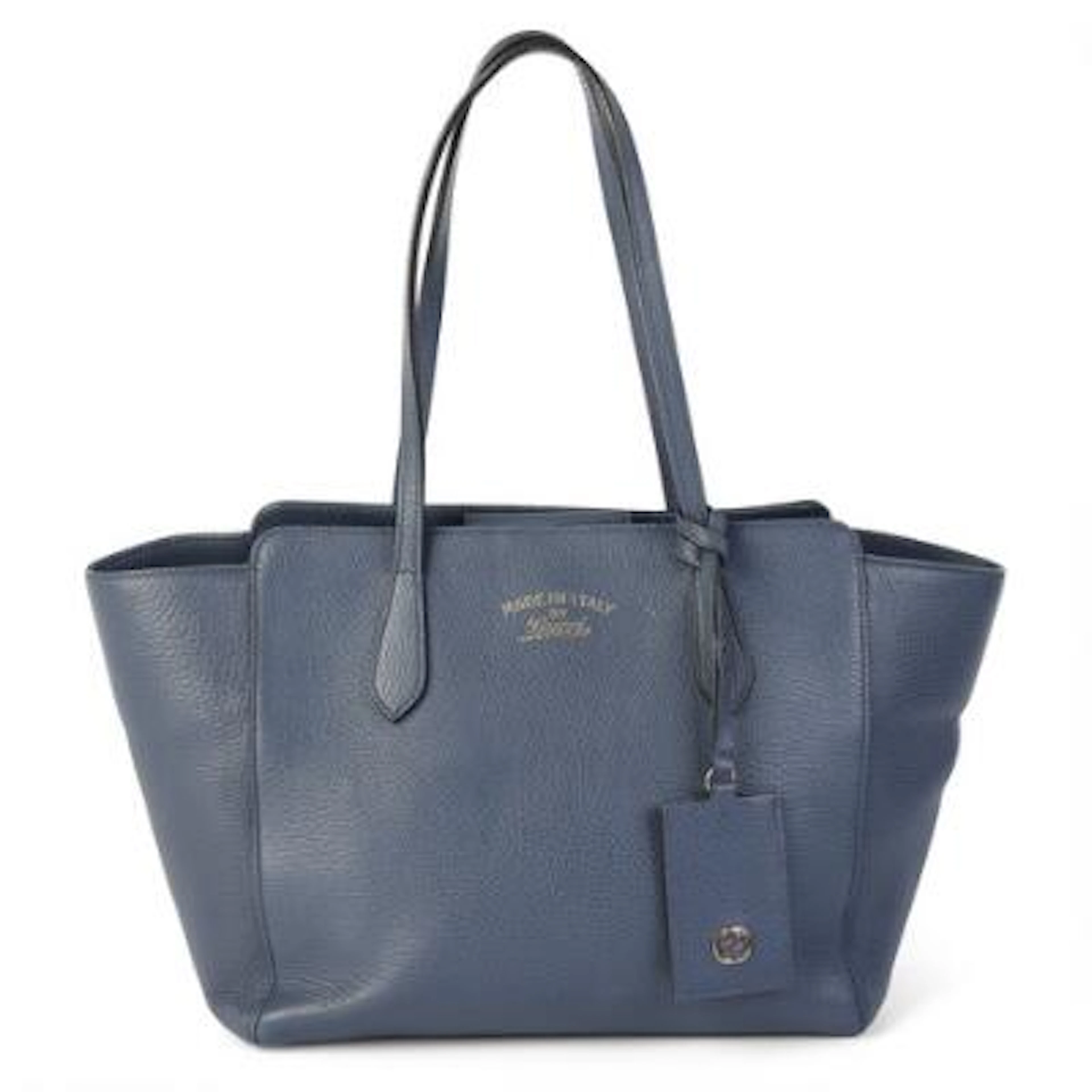 Gucci: A "Swing" tote bag of blue leather with gold tone hardware