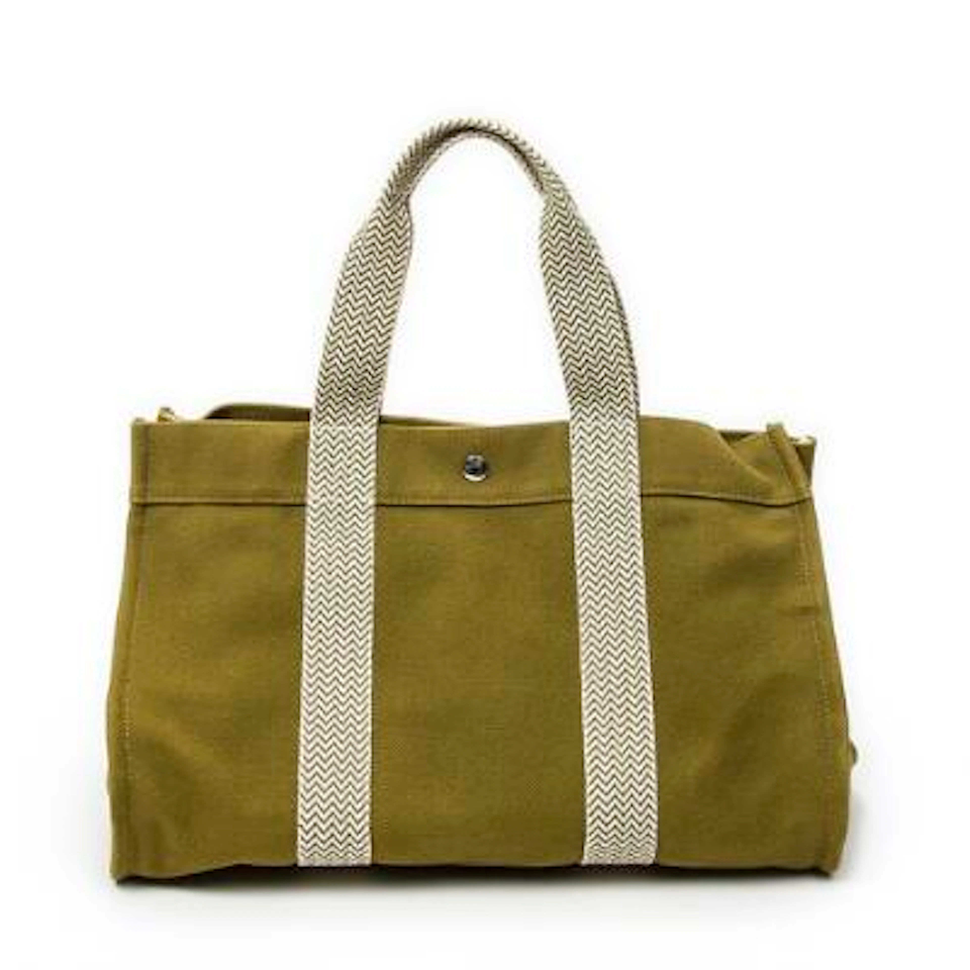 Hermès: A "Cannes MM" bag in green and white Toile-canvas with palladium