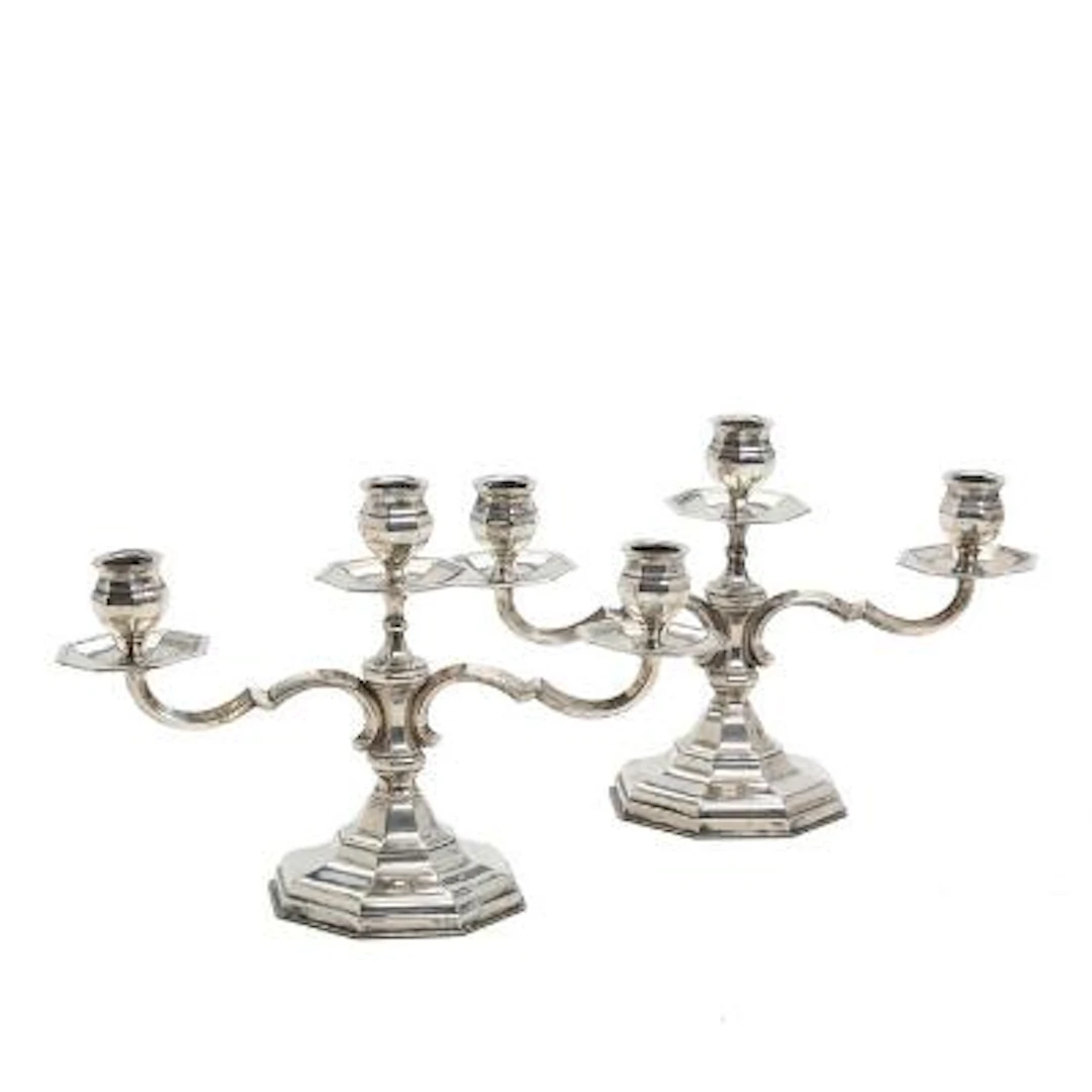 Hugo Grün: A pair of three-armed silver candelabra. 20th century.