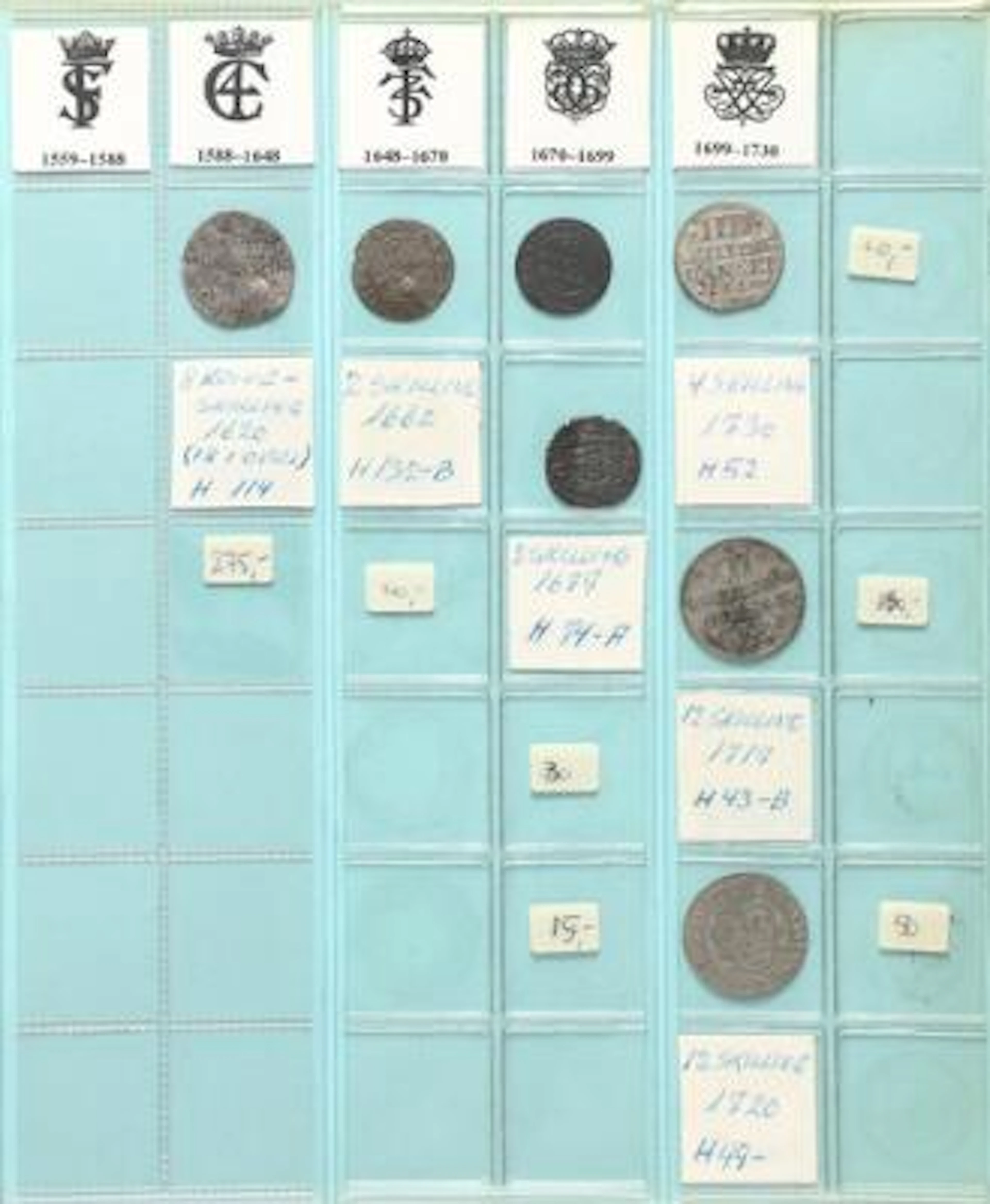 7 albums and a box containing a collection of Danish and foreign coins