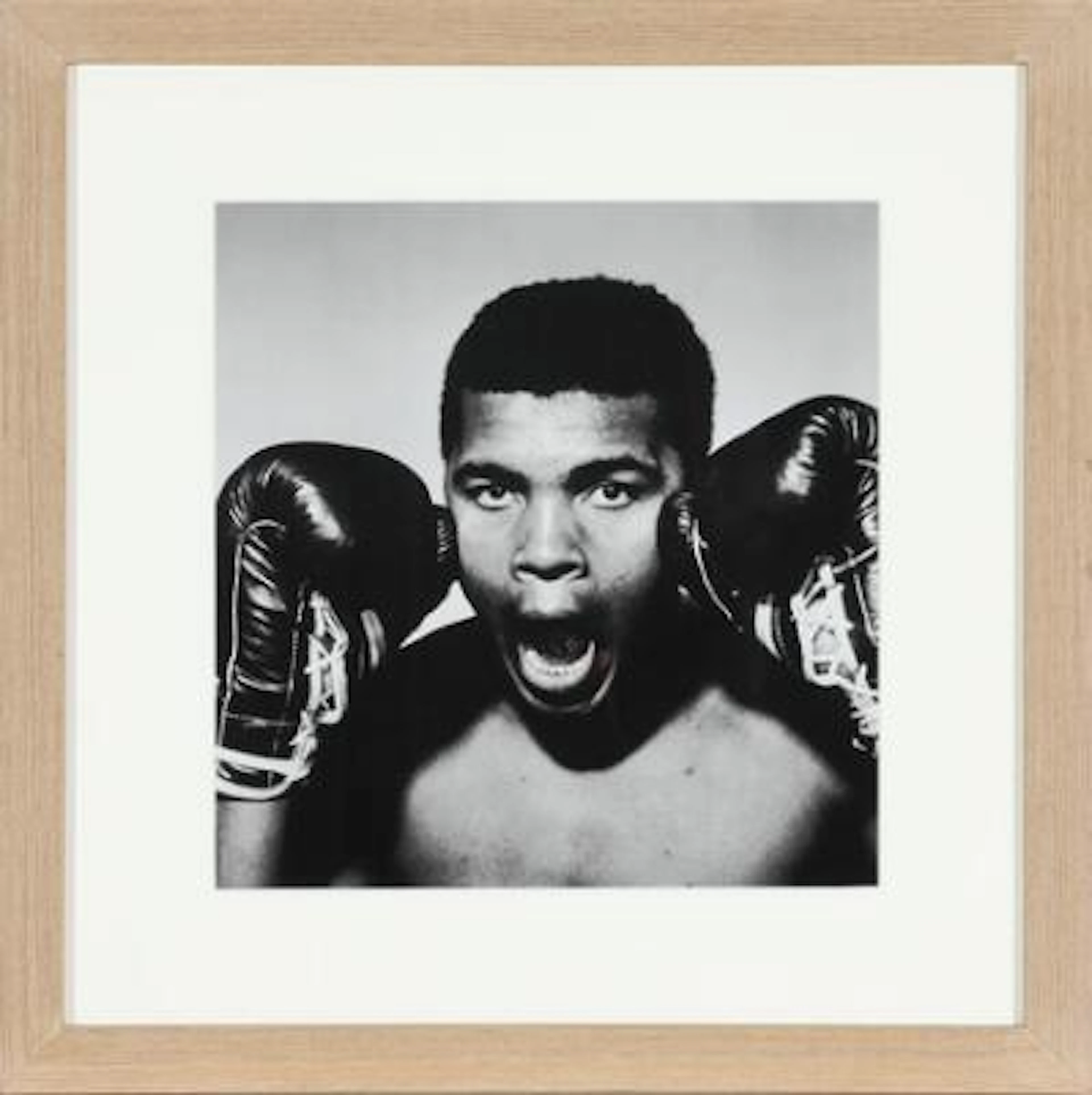 Large black-and-white portrait of the American heavyweight boxer Muhammad