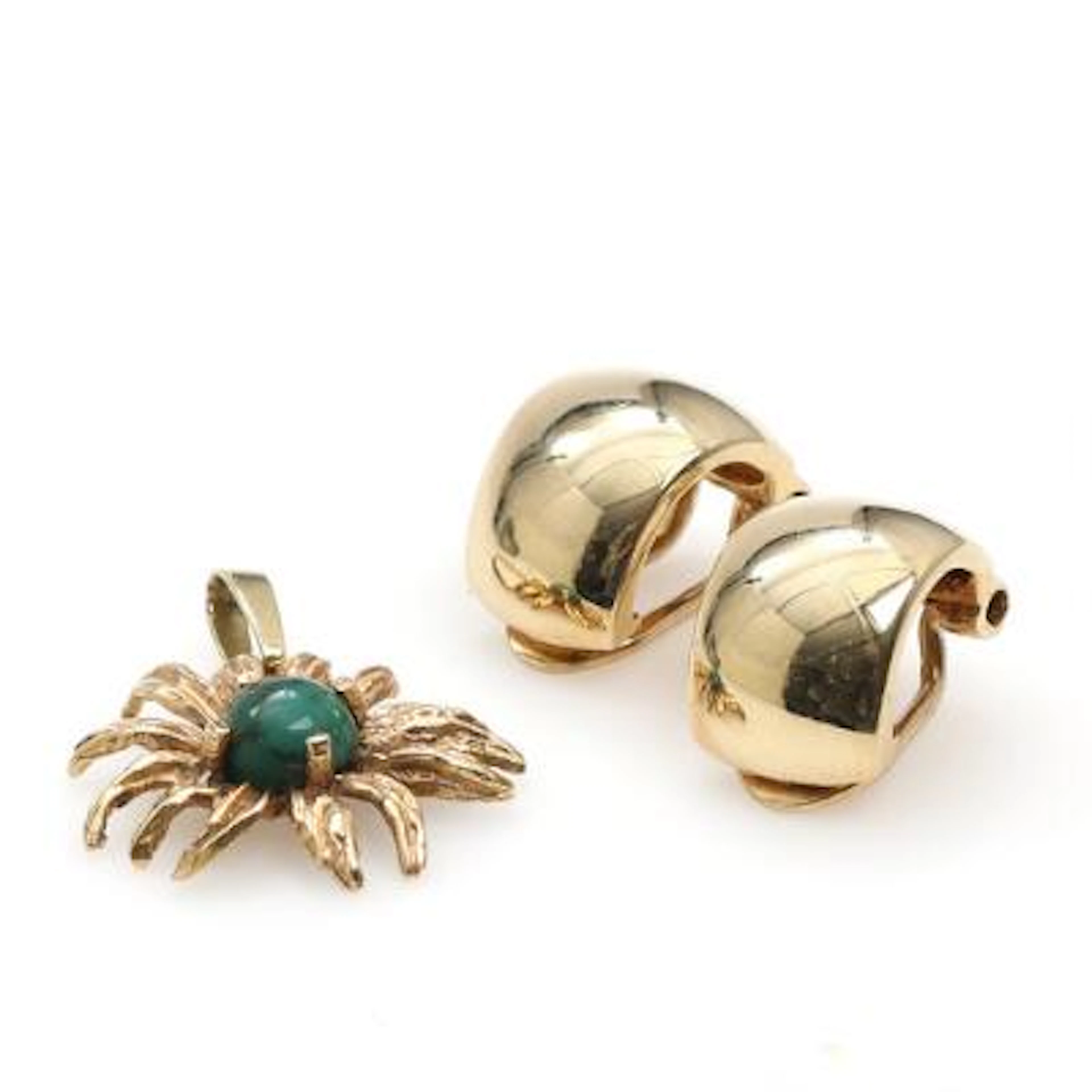 A 14k gold abd turquoise pendant and a pair of 8k gold ear clips.