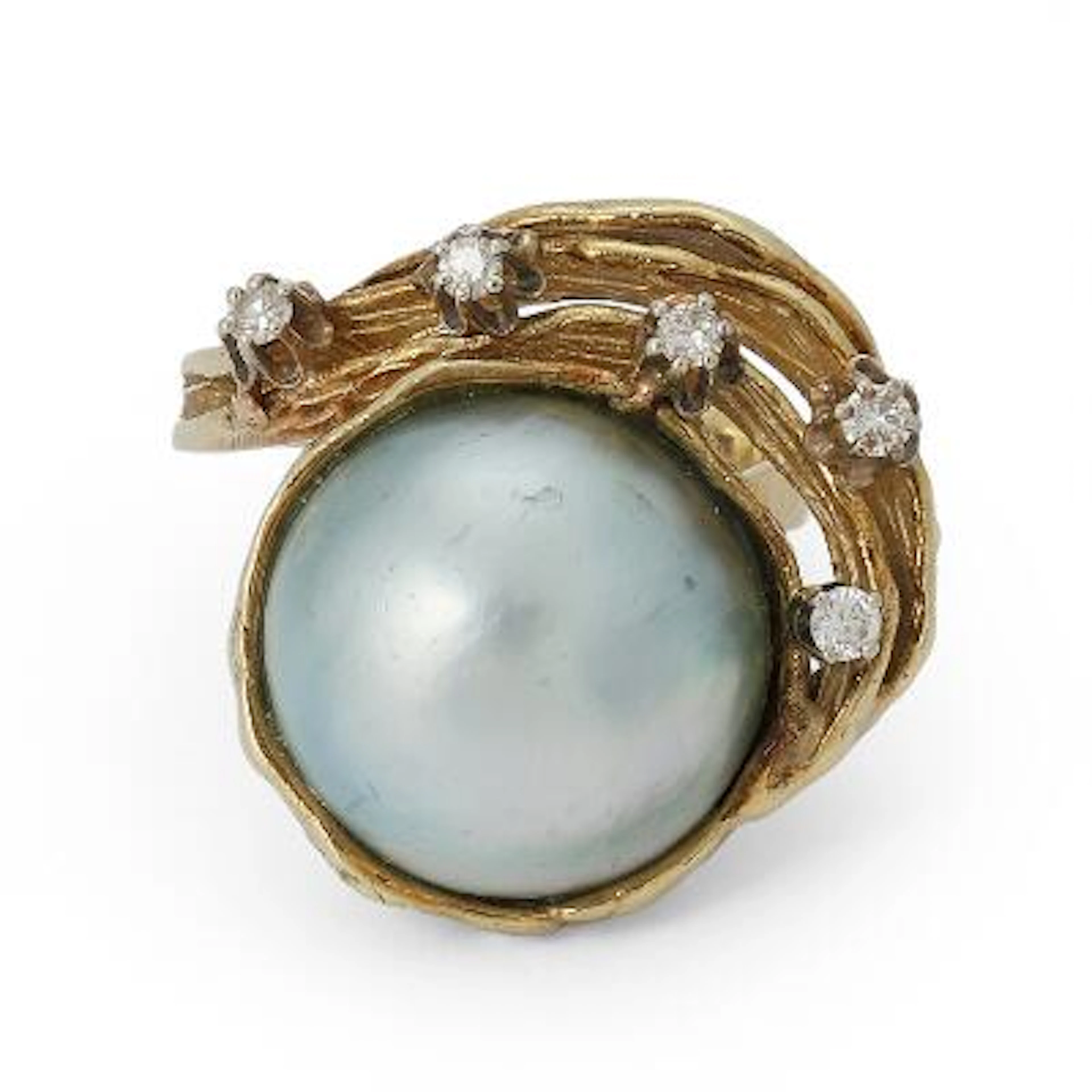 A pearl and diamond ring set with a pearl and diamonds, mounted in