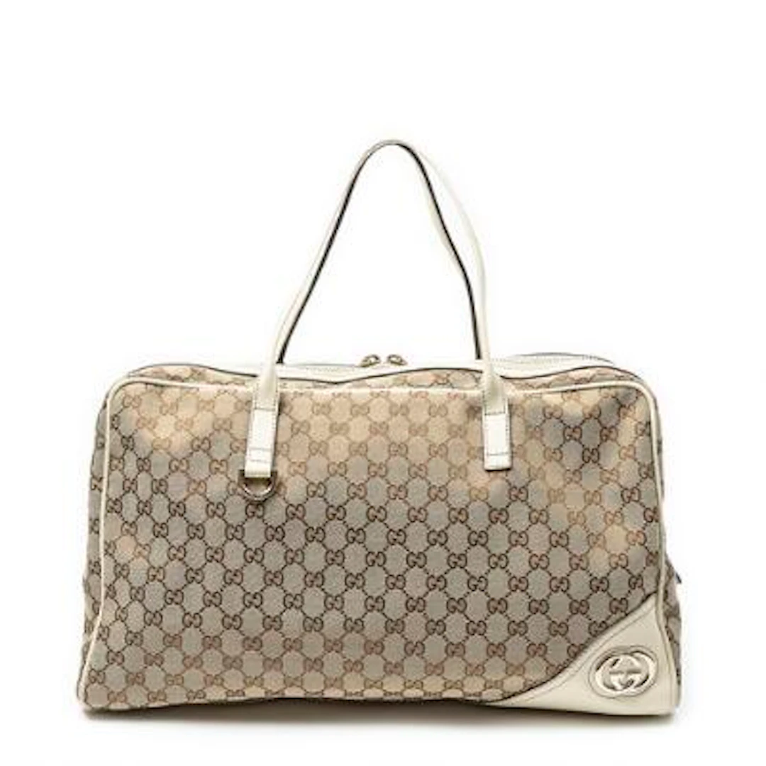 Gucci: A "Large New Britt Boston" bag of beige/brown monogram canvas