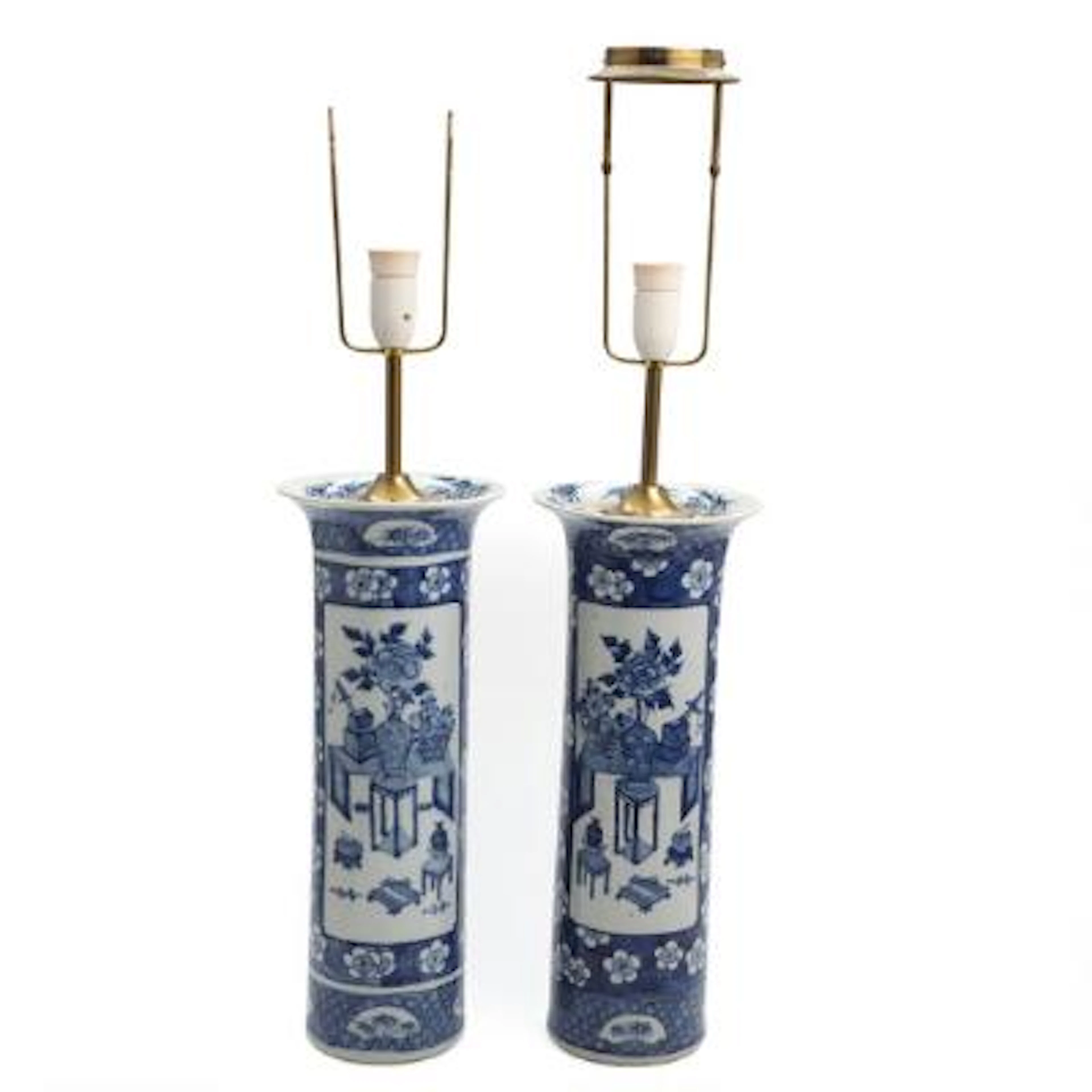A pair of Chinese blue and white sleeve vases. Mounted as table lamps.