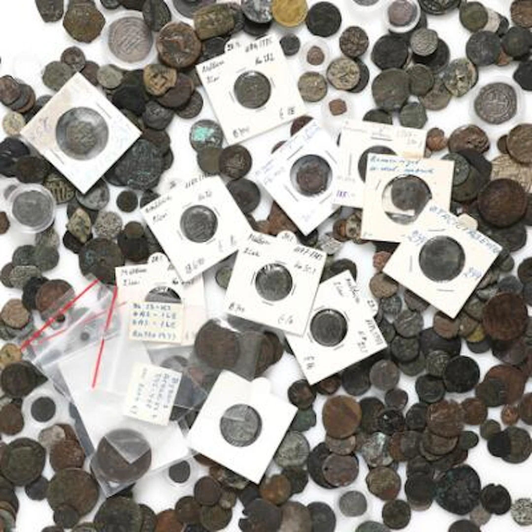 Box containing a large quantity of older coins from the Middle East