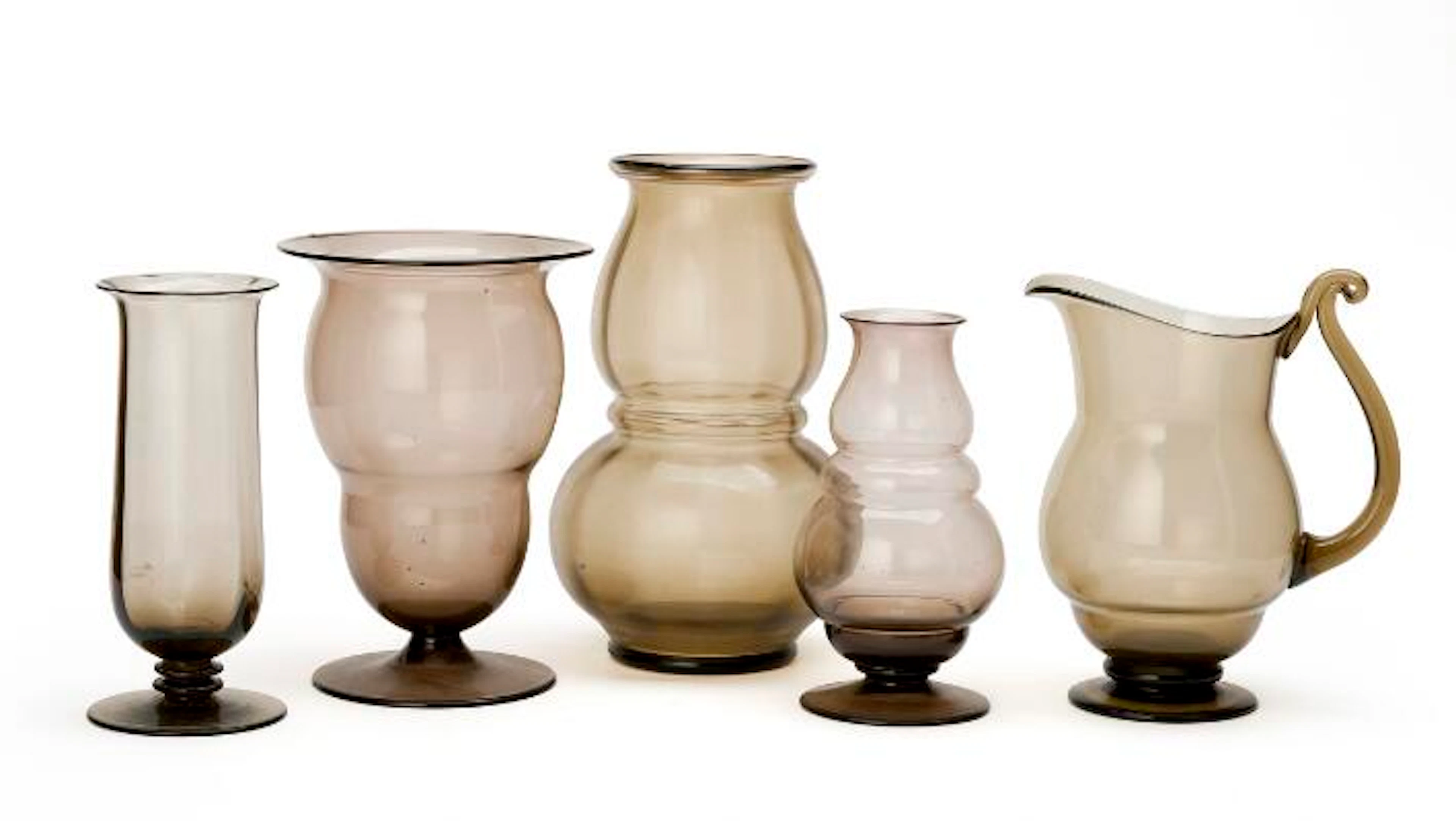 Jacob Eiler Bang and others: Four vases and a jug of smoky glass.