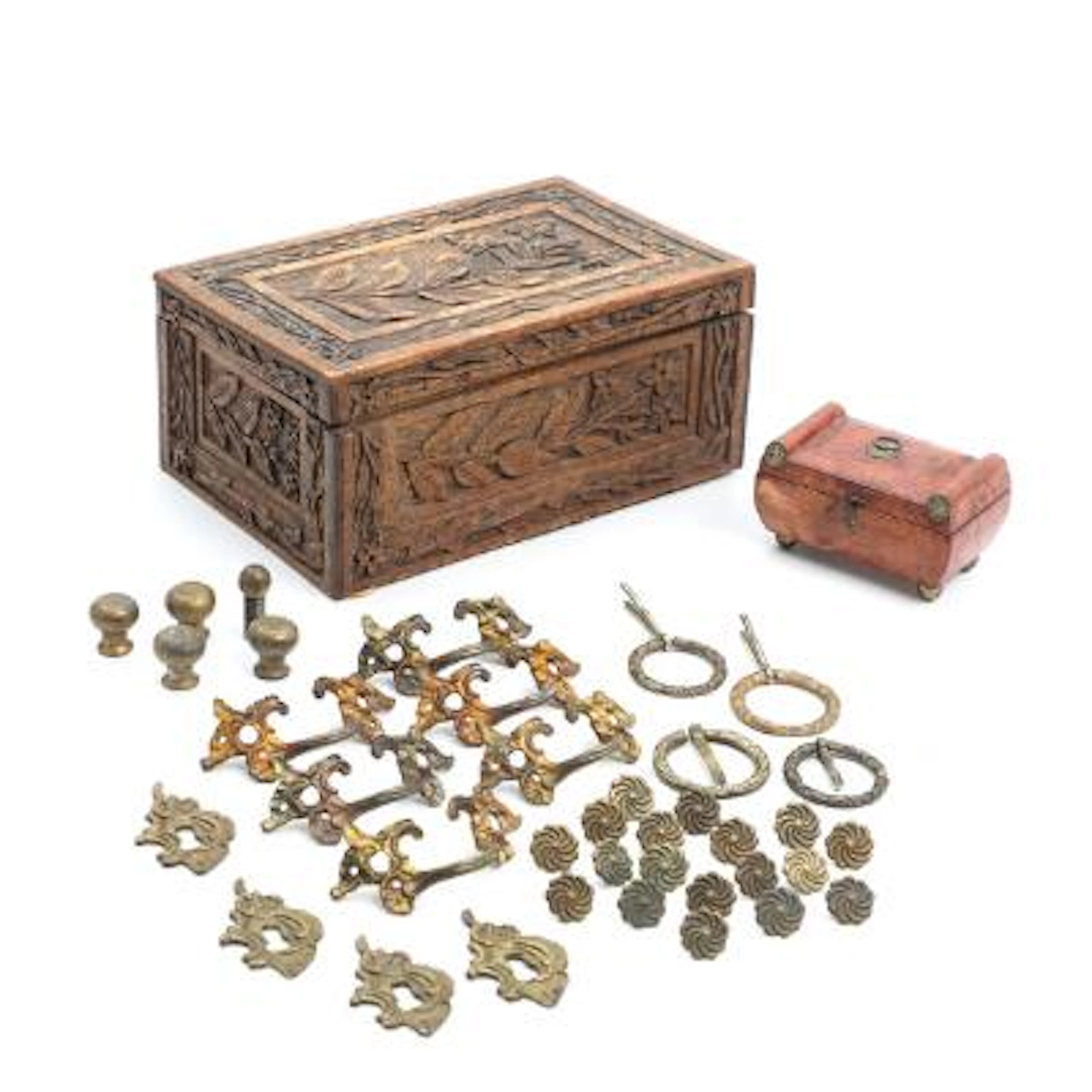 Collection of mounts in partly gilded bronze and two sewing boxes.