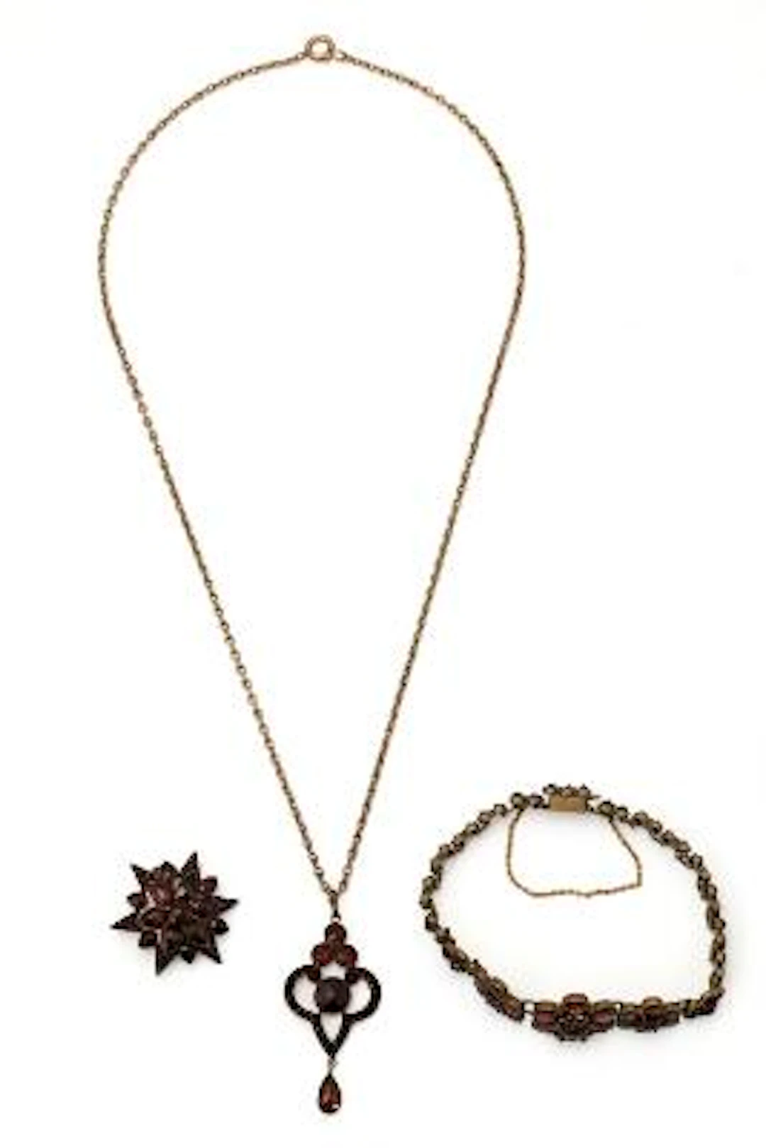 A jewellery collection comprising necklace, bracelet and a brooch