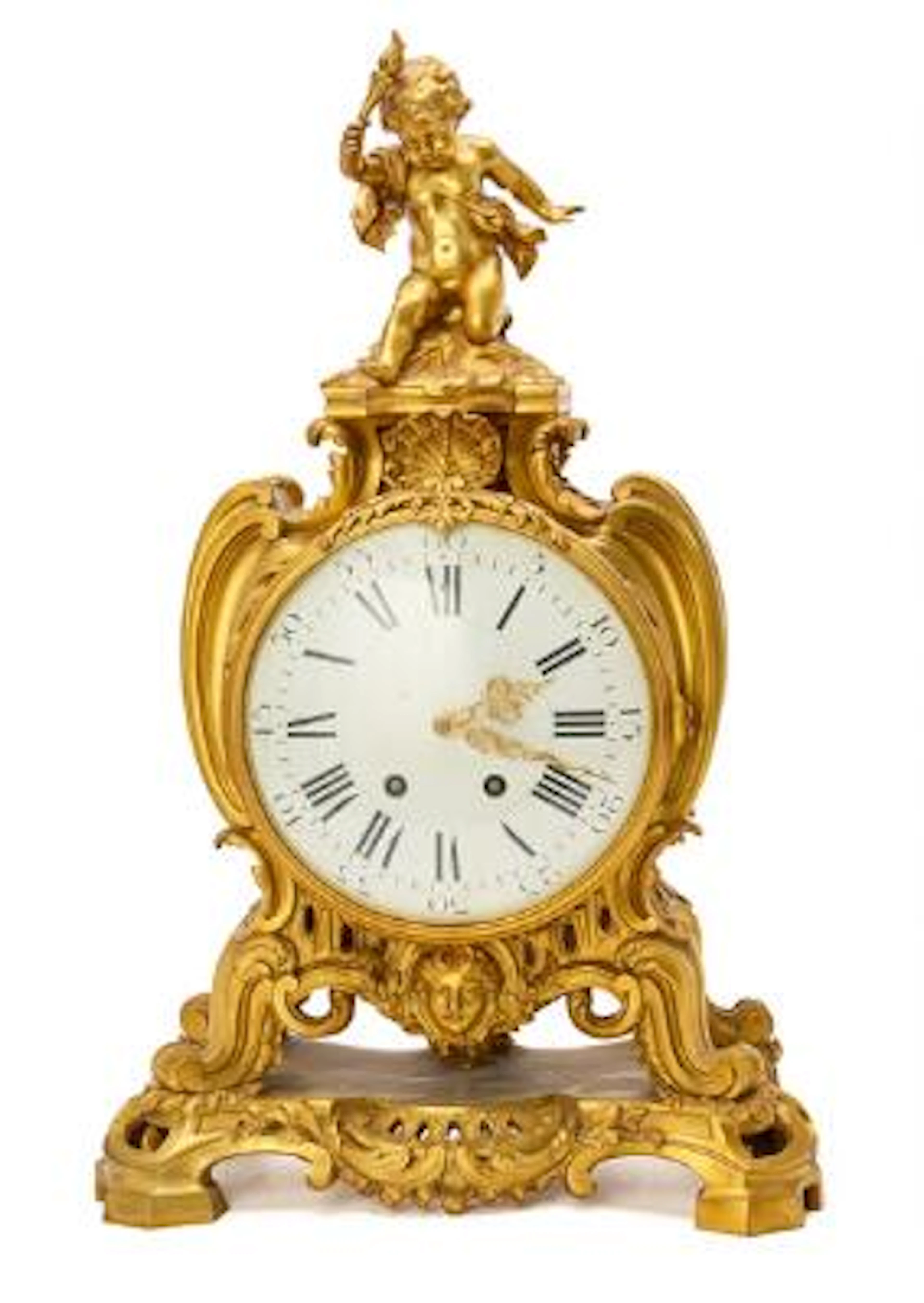 A French Napoleon III mantel clock of gilded bronze, white enamel