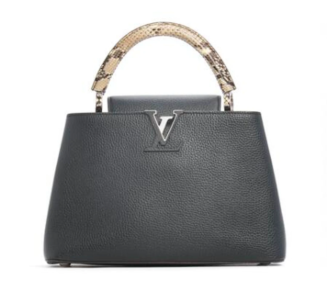 Louis Vuitton: A "Capucines MM" bag of black Taurillon leather with