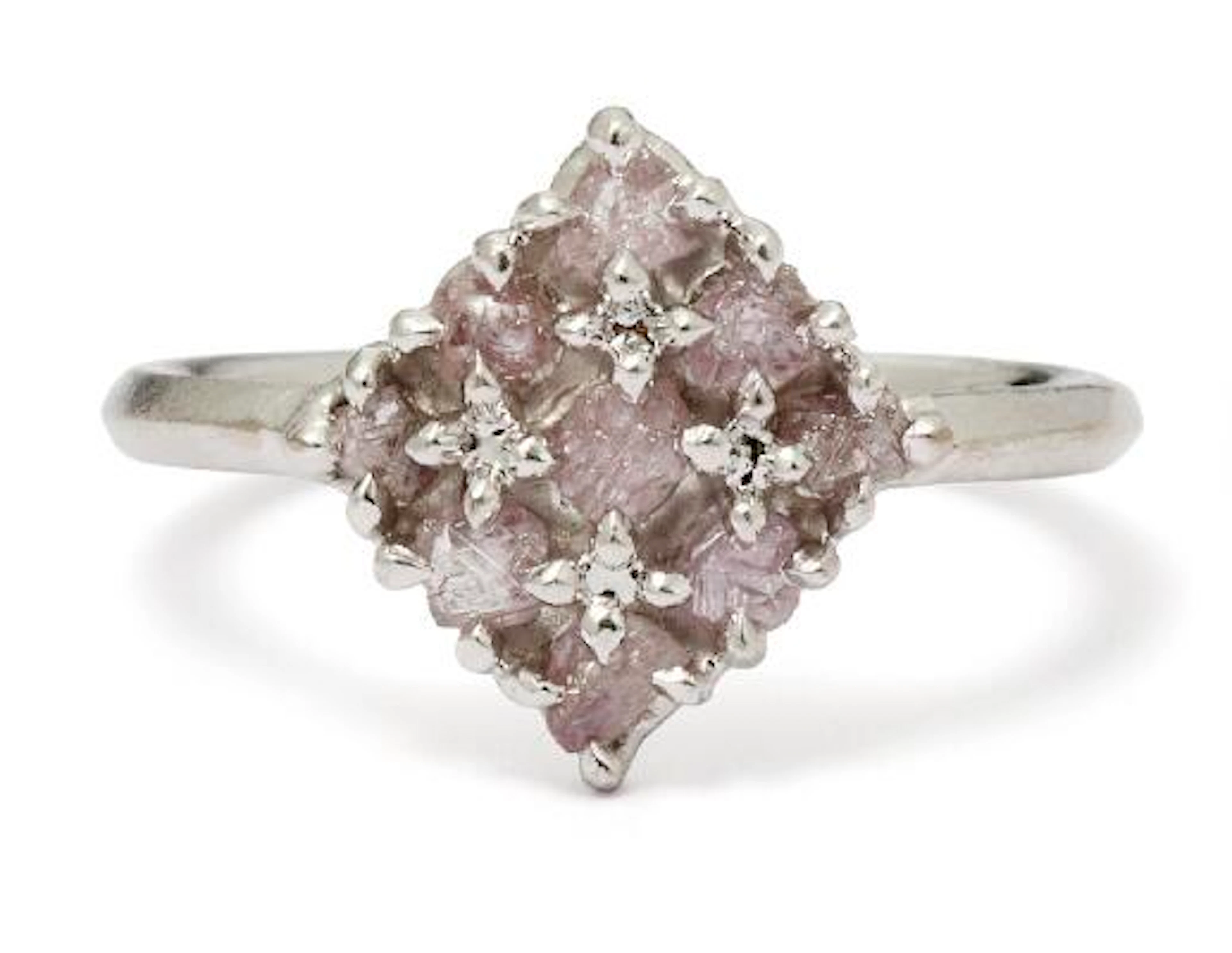 Rough Diamonds: A diamond ring set with rough pink diamonds, mounted