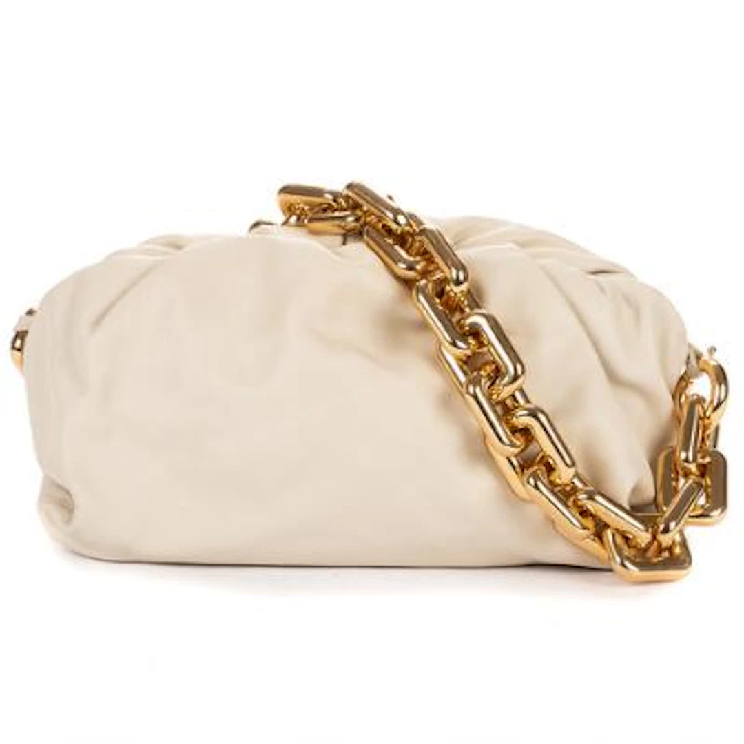 Bottega Veneta: A "Chain Pouch" in beige leather with a golden chain