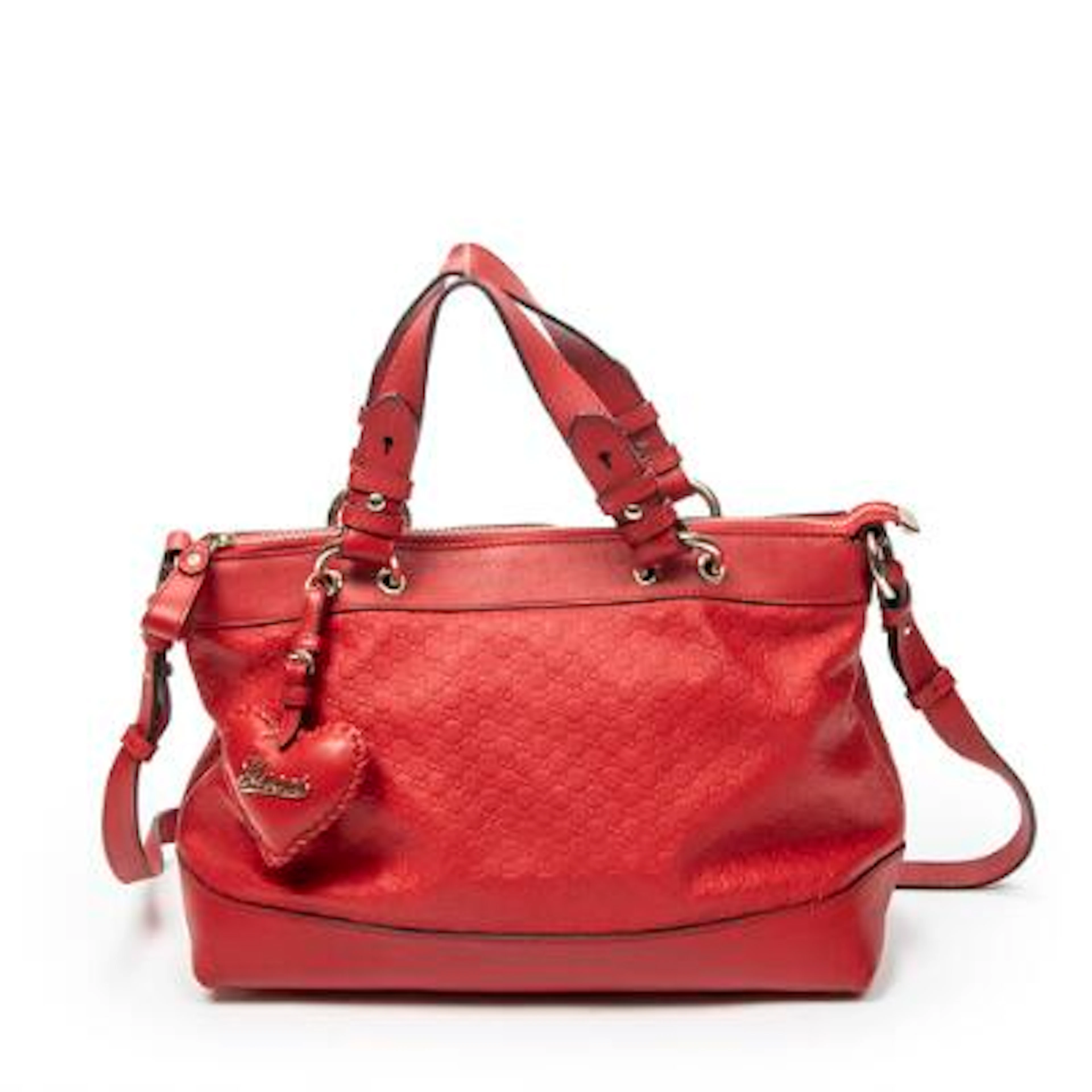 Gucci: A "Valentine Tote" bag of red monogrammed leather with gold