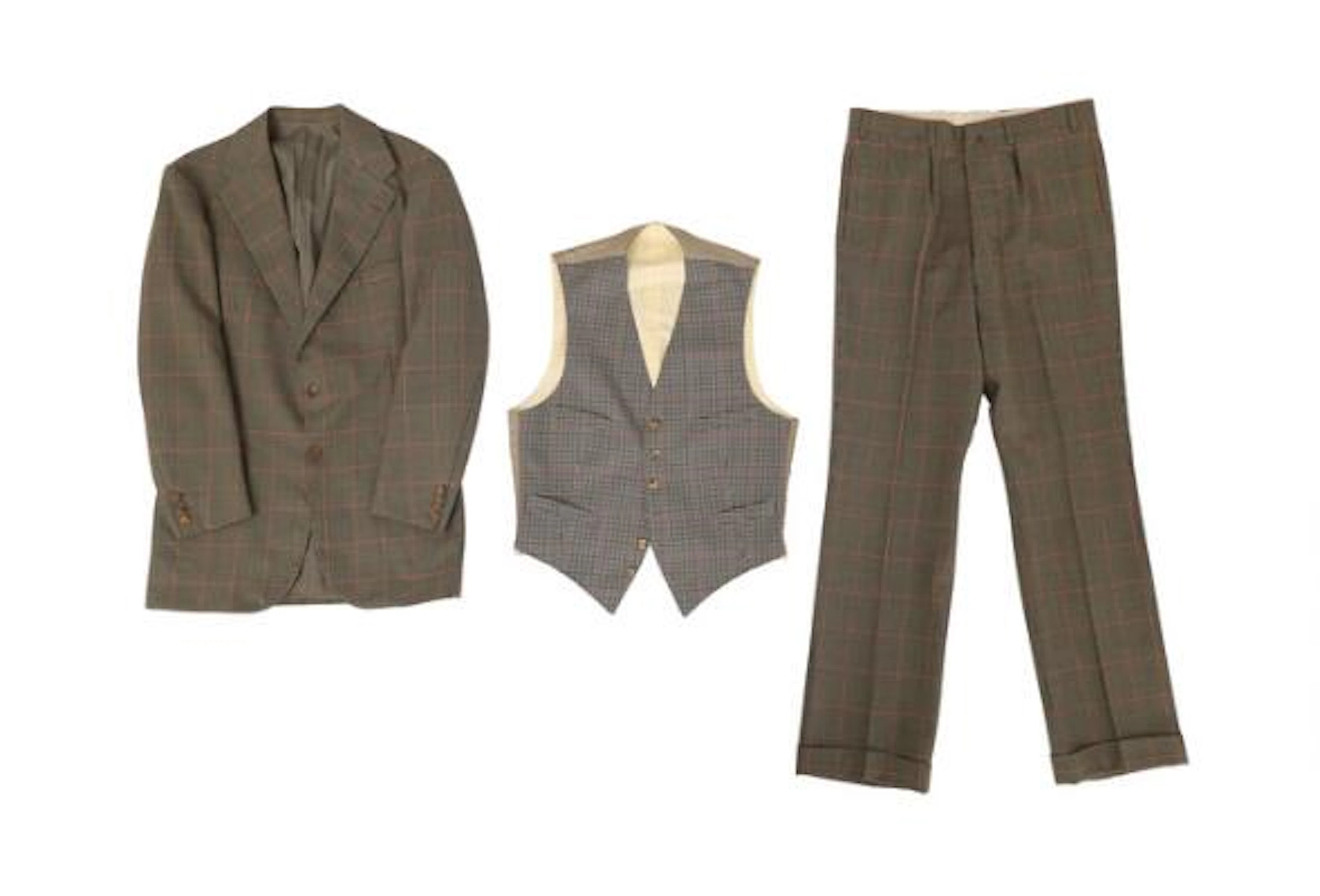 Alfred Alm: A three-piece sports suit in tan English tweed. 1977.