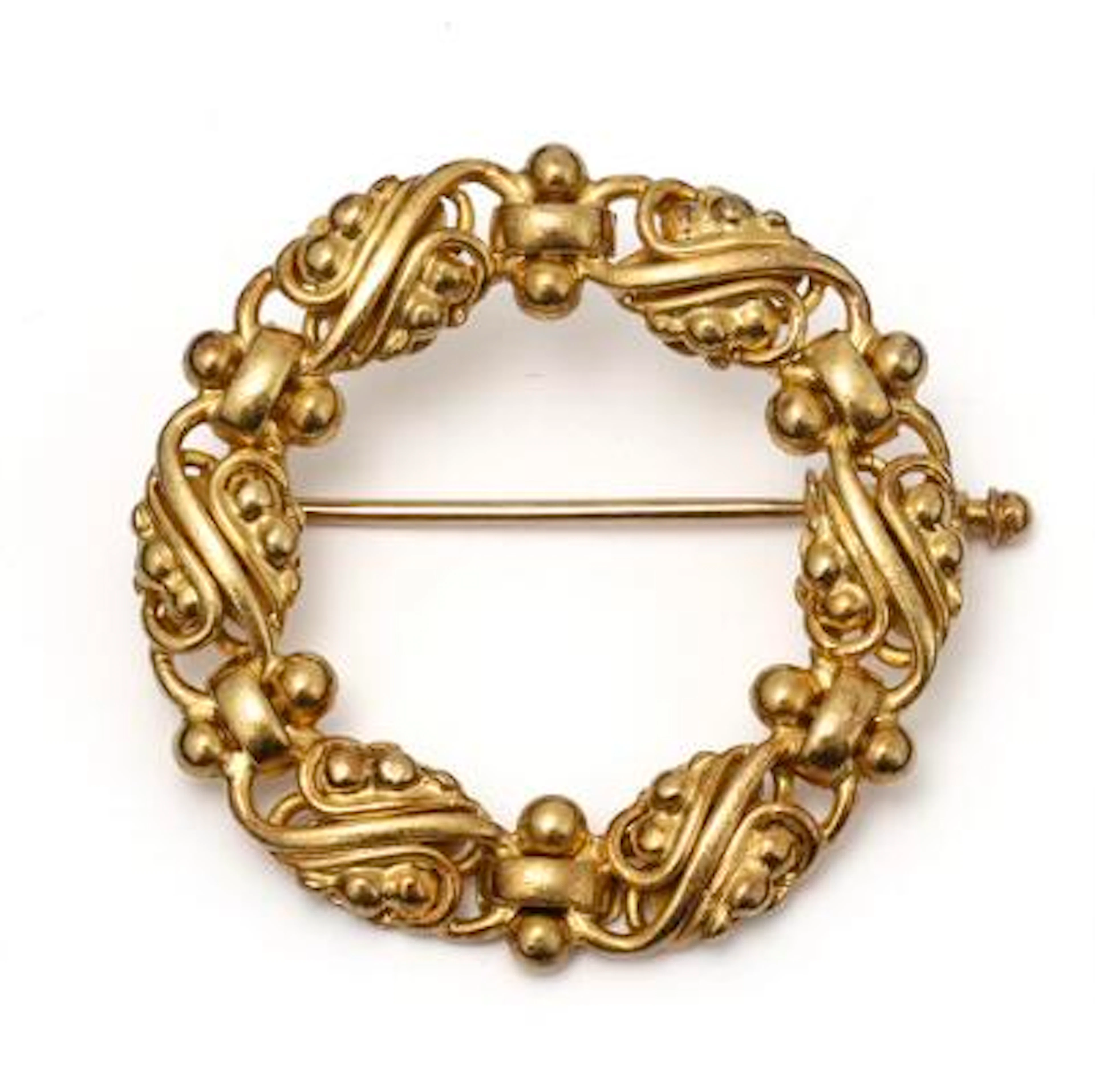 Evald Nielsen: A brooch of 14k gold. Weight app. 7.35 g. Diam. 3 cm.