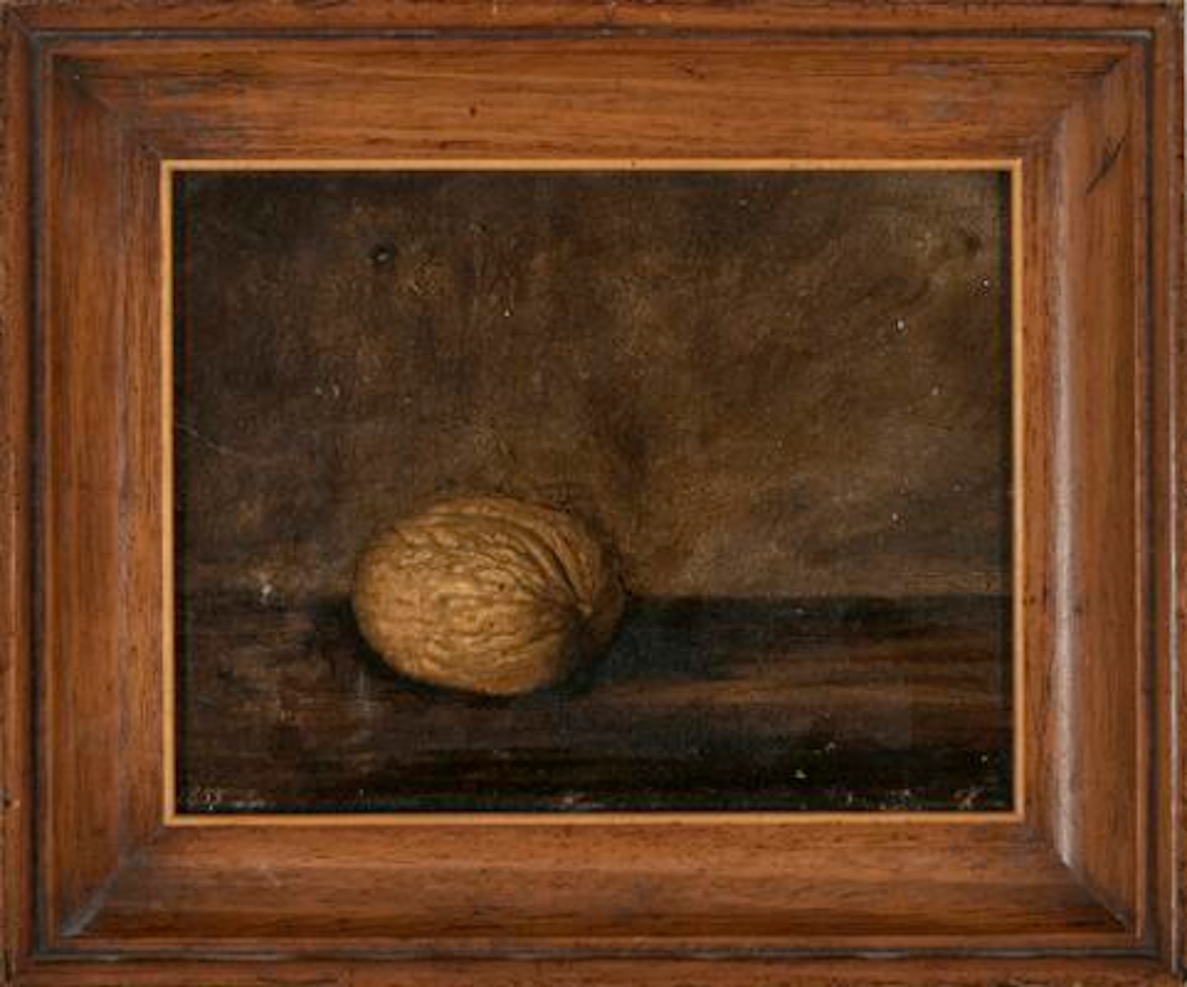 Ubekendt kunstner: Still life with walnut. Signed monogram 1855. Oil