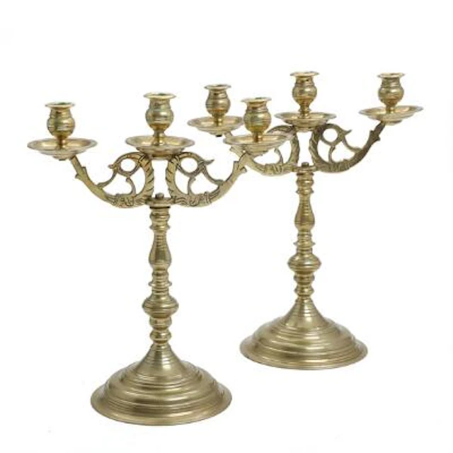 A pair of three-armed bronze candelabra, baluster-form stems on round