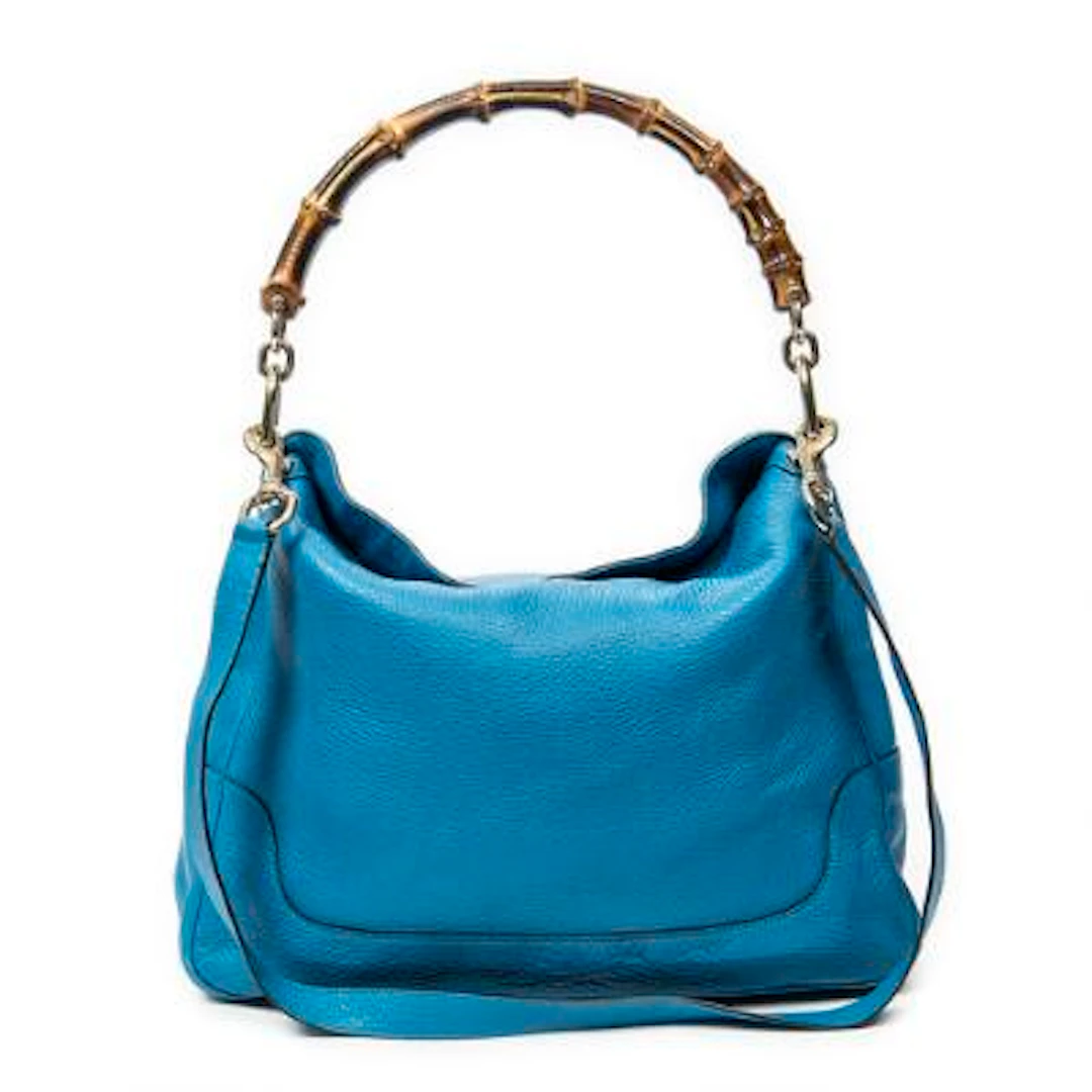Gucci: A "Medium Diana Bamboo Hobo" bag in blue leather with a bamboo