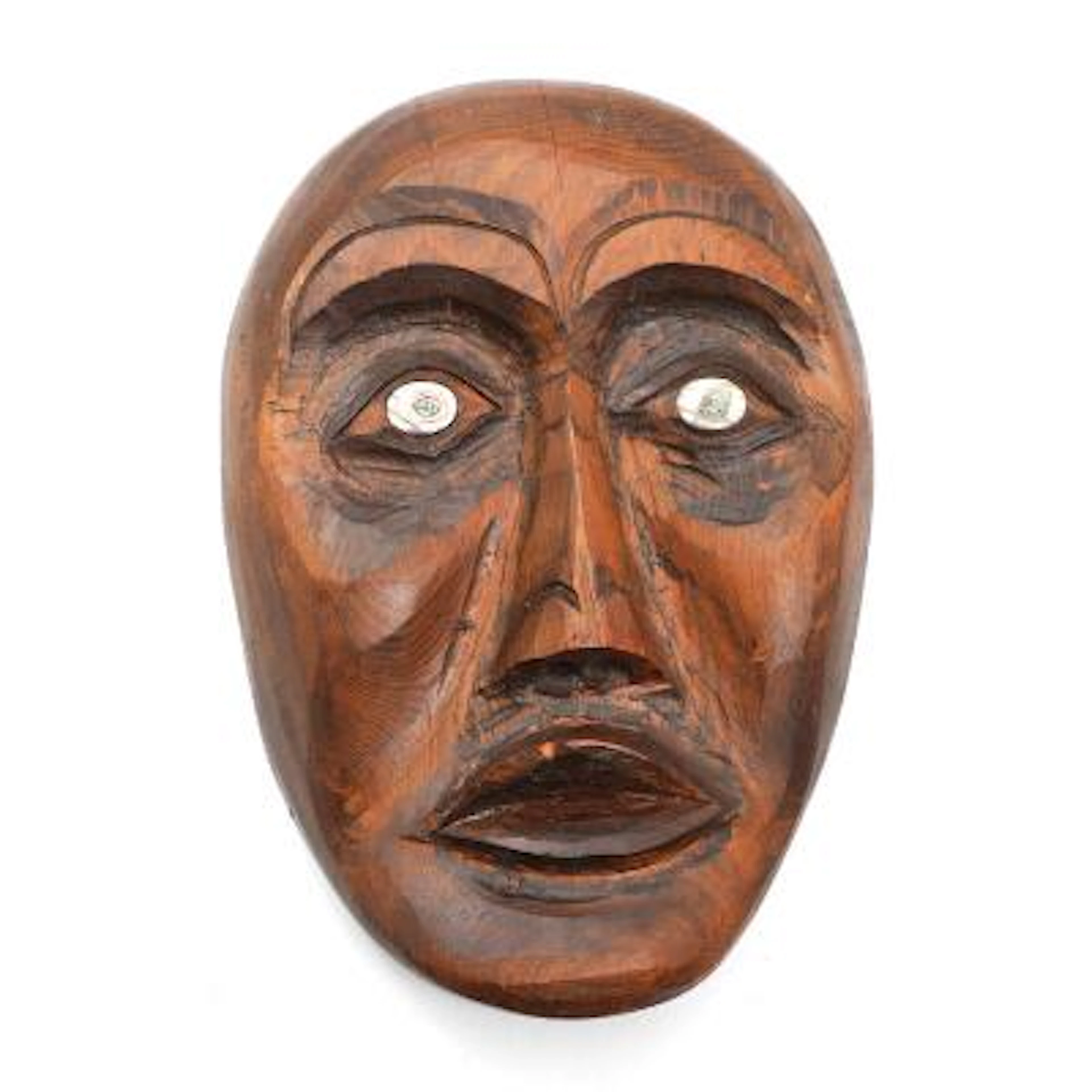 Lyle Wilson: Mask of carved and stained wood, eyes of mother of pearl.