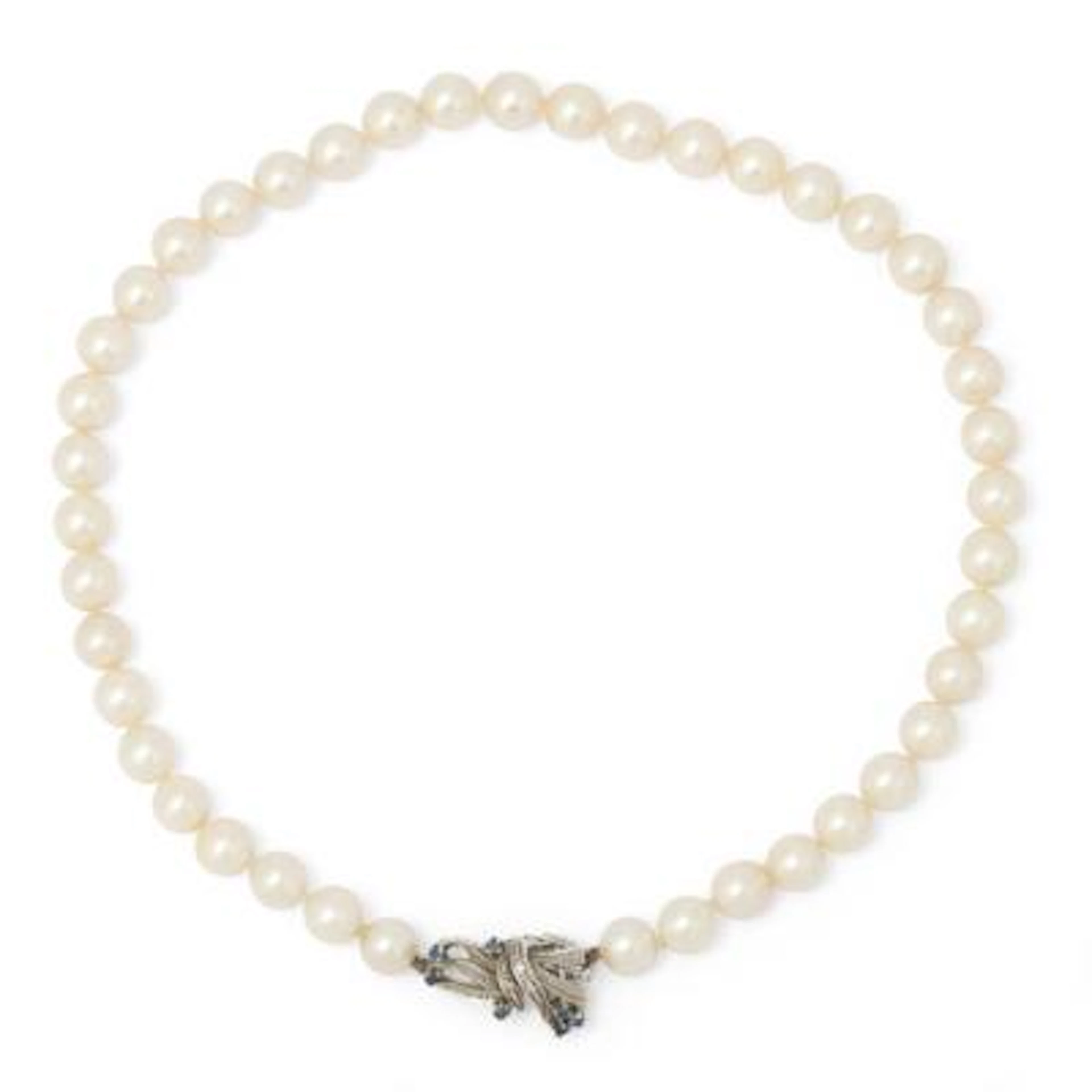 A pearl necklace set with numerous pearls and a sapphire- and diamond
