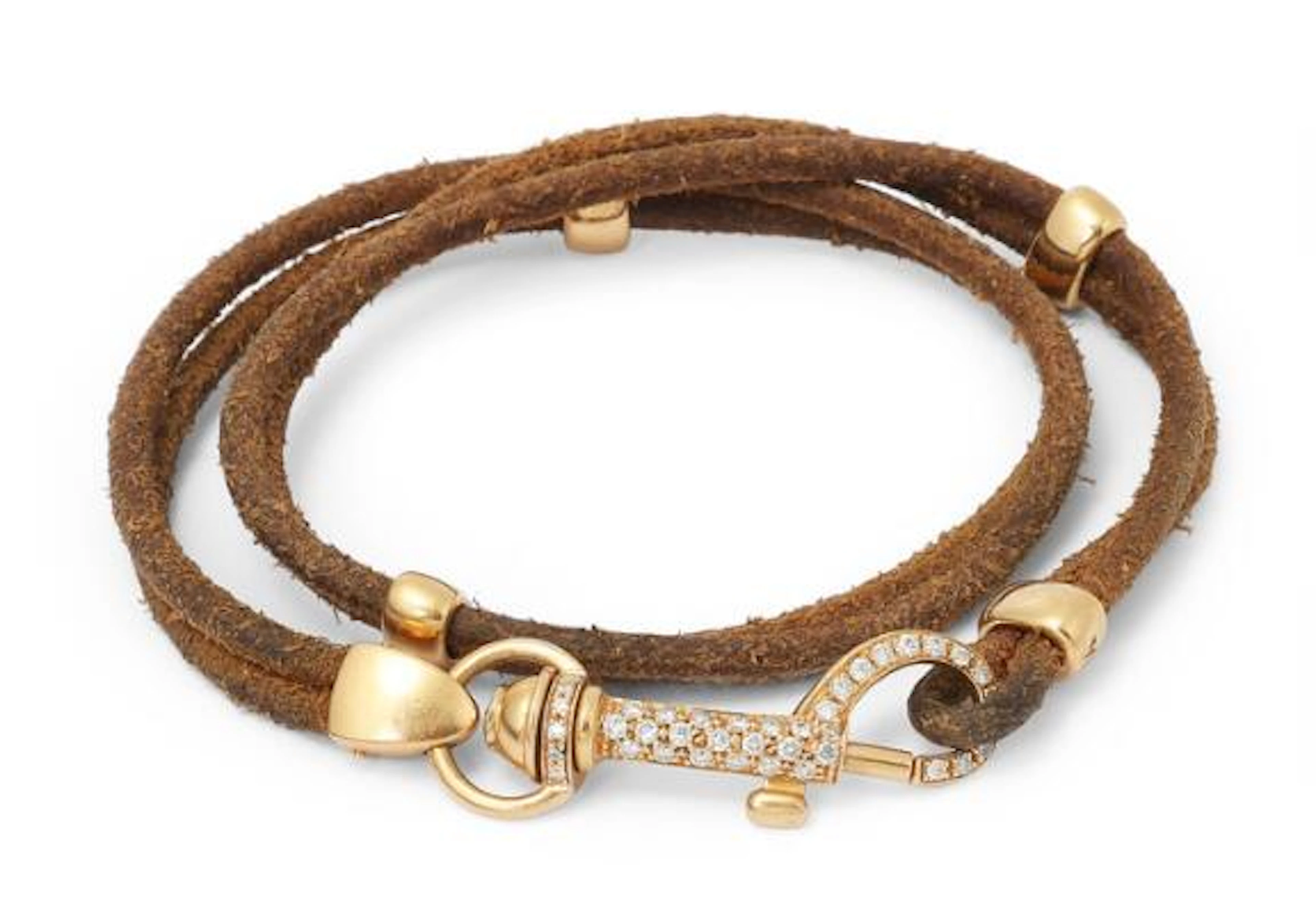 Oromalia: A bracelet set with brilliant-cut diamonds, mounted in leather
