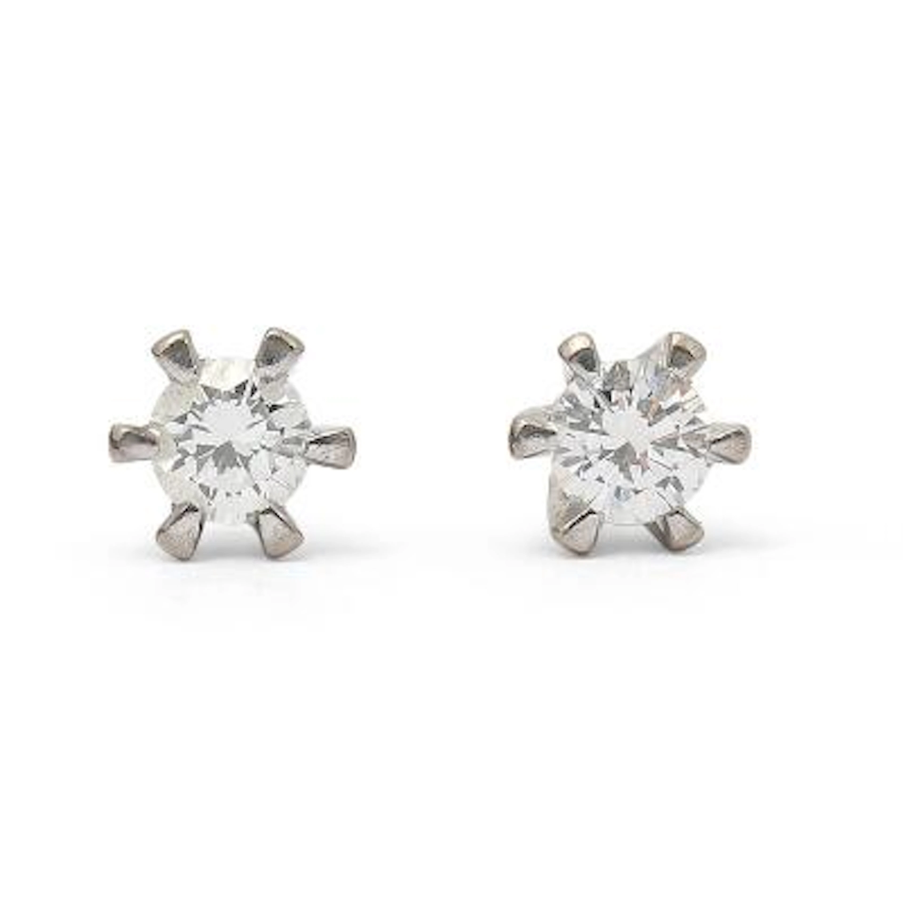 A pair of solitaire diamond ear studs each set with a brilliant-cut