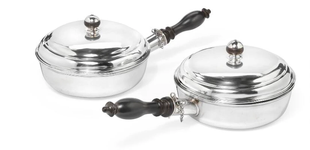 Christian Werum: A pair of Danish Louis XVI silver lidded saucepans.