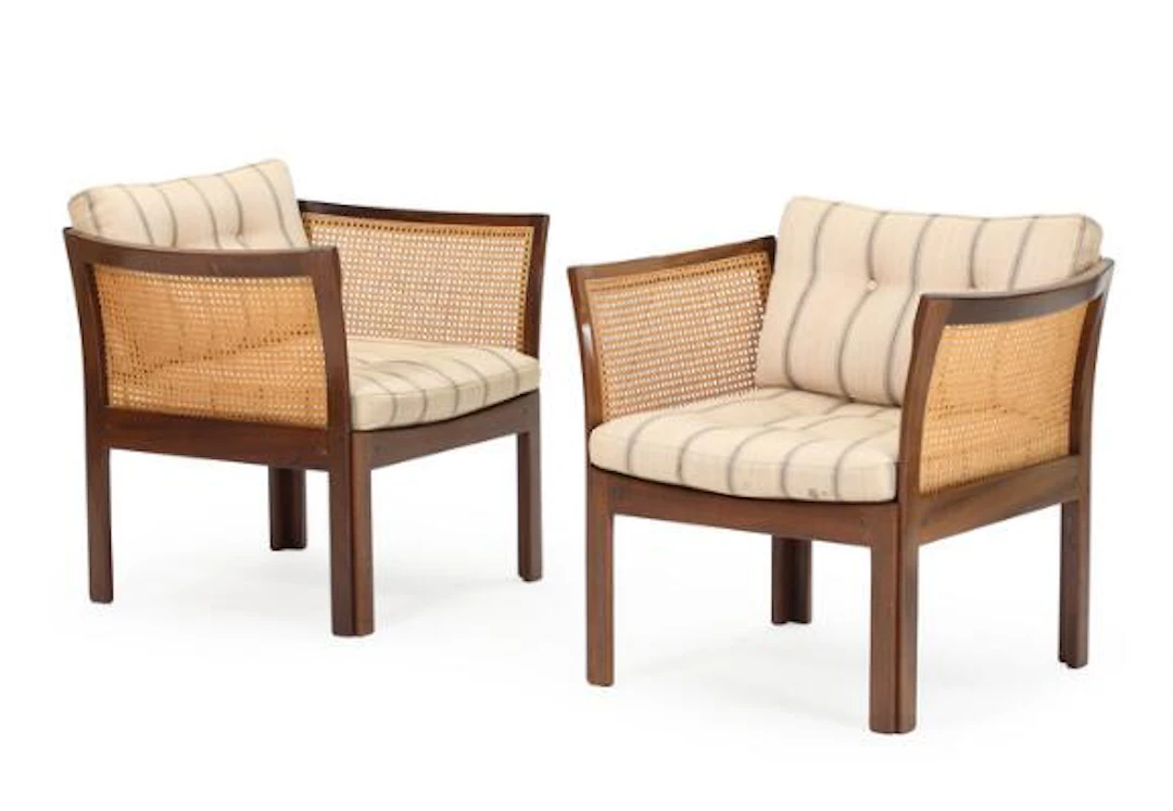 Illum Wikkelsø: "Plexus". A pair of mahogany easy chairs, sides and