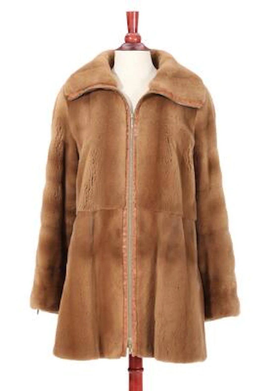 Birger Christensen: A short coat of sheared mink fur with ostrich