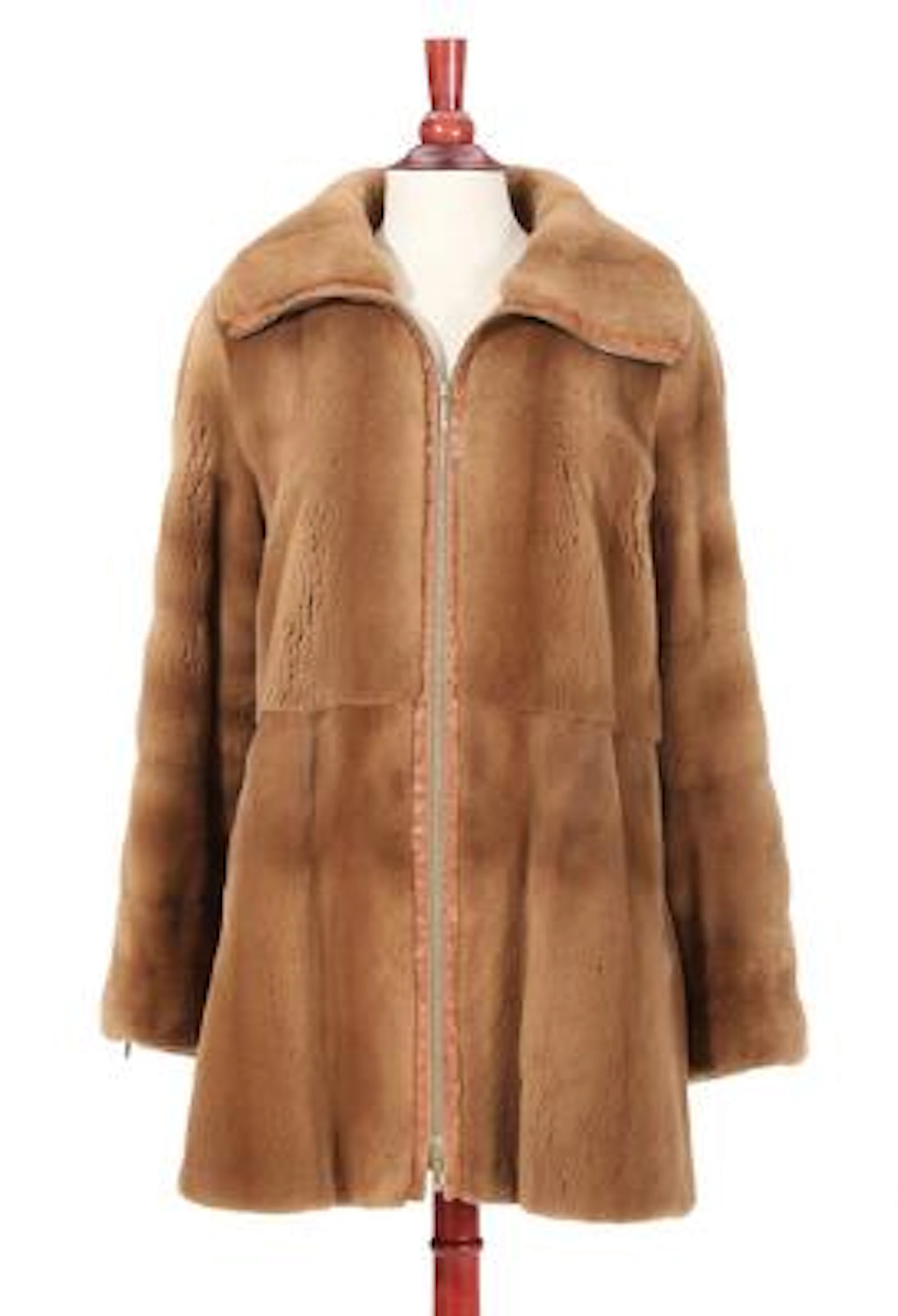 Birger Christensen: A short coat of sheared mink fur with ostrich