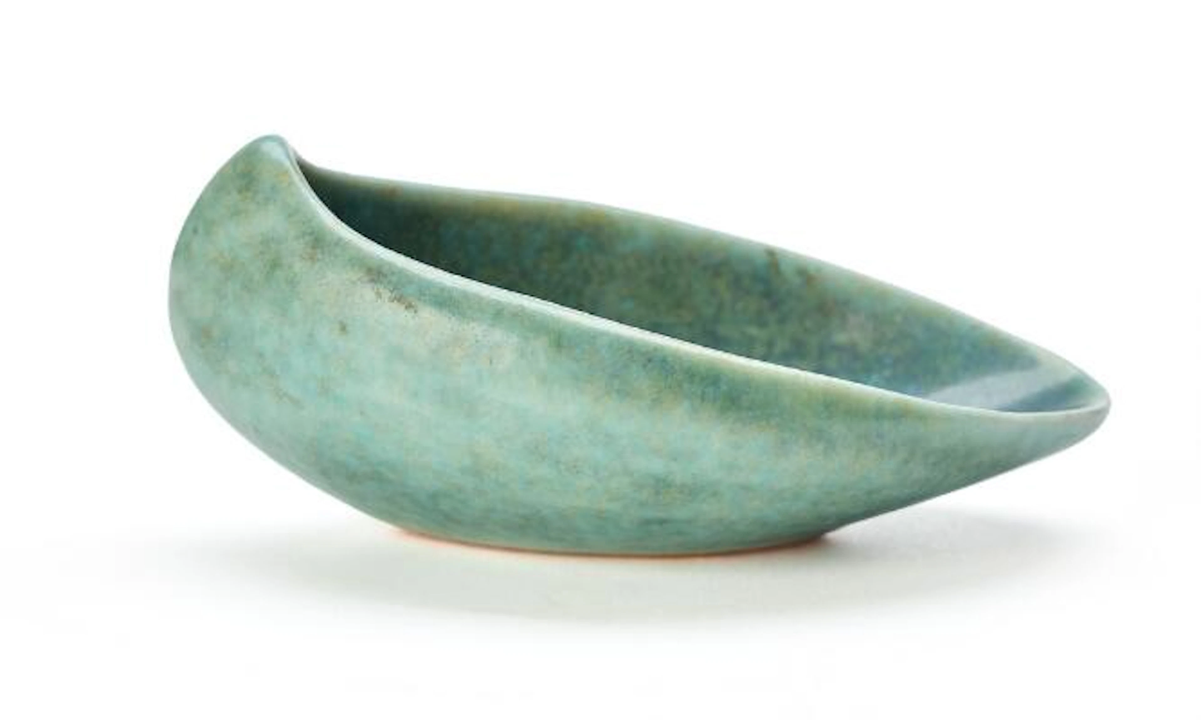 Erik Rahr: A stoneware pipe rest, decorated with turquoise-green glaze.