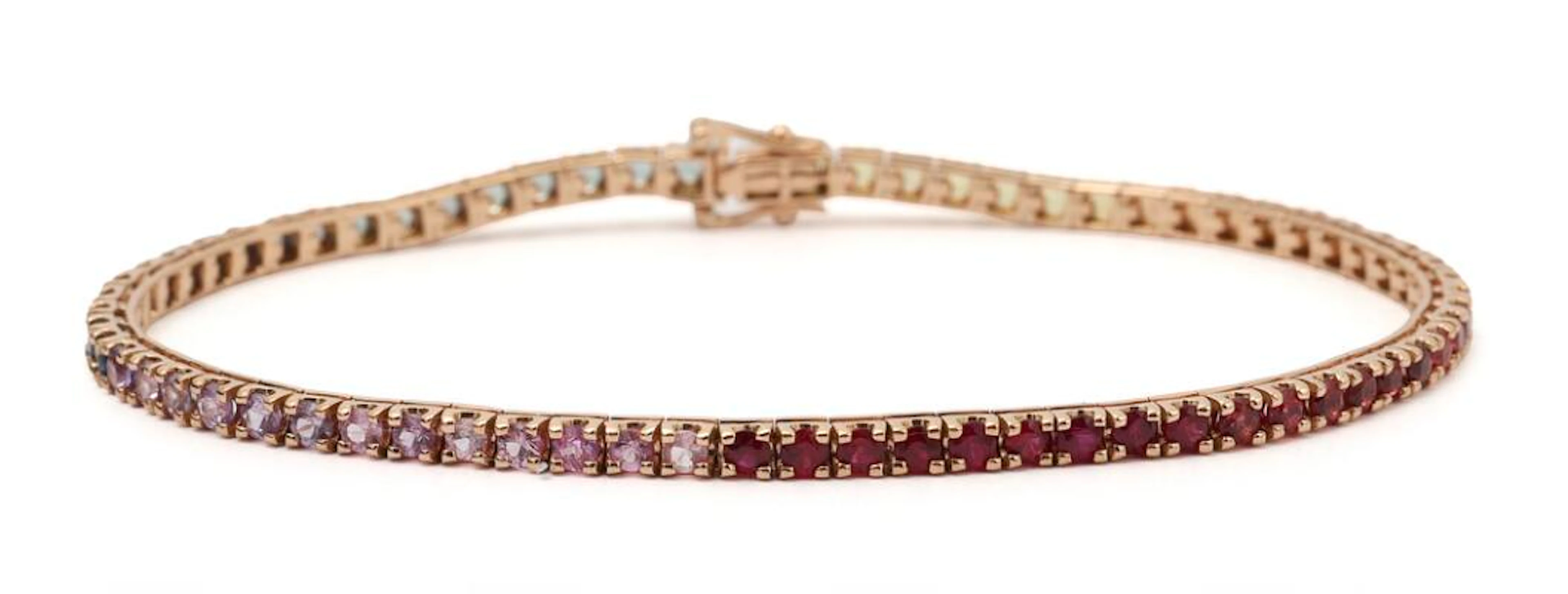 A sapphire bracelet set with numerous circular-cut multicolour sapphires
