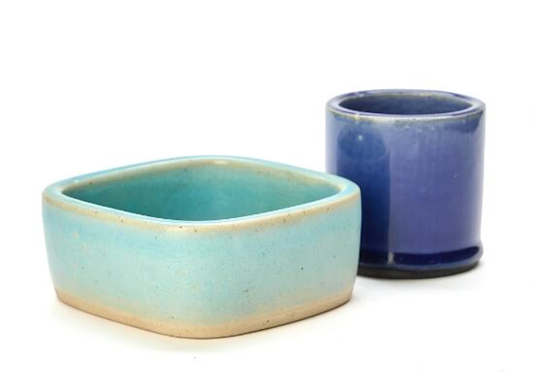 Christian Poulsen: A stoneware four-sided bowl and cylindrical vase.