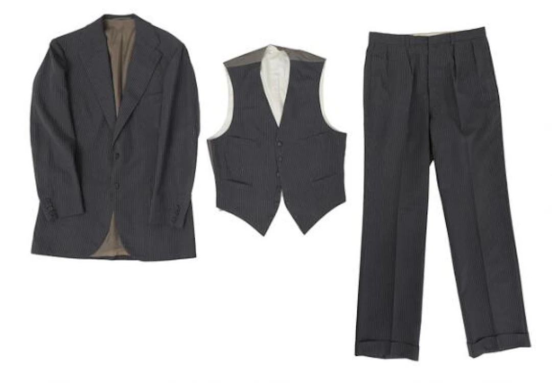 Alfred Alm: A three-piece charcoal grey pinstripe summer suit. 1982.