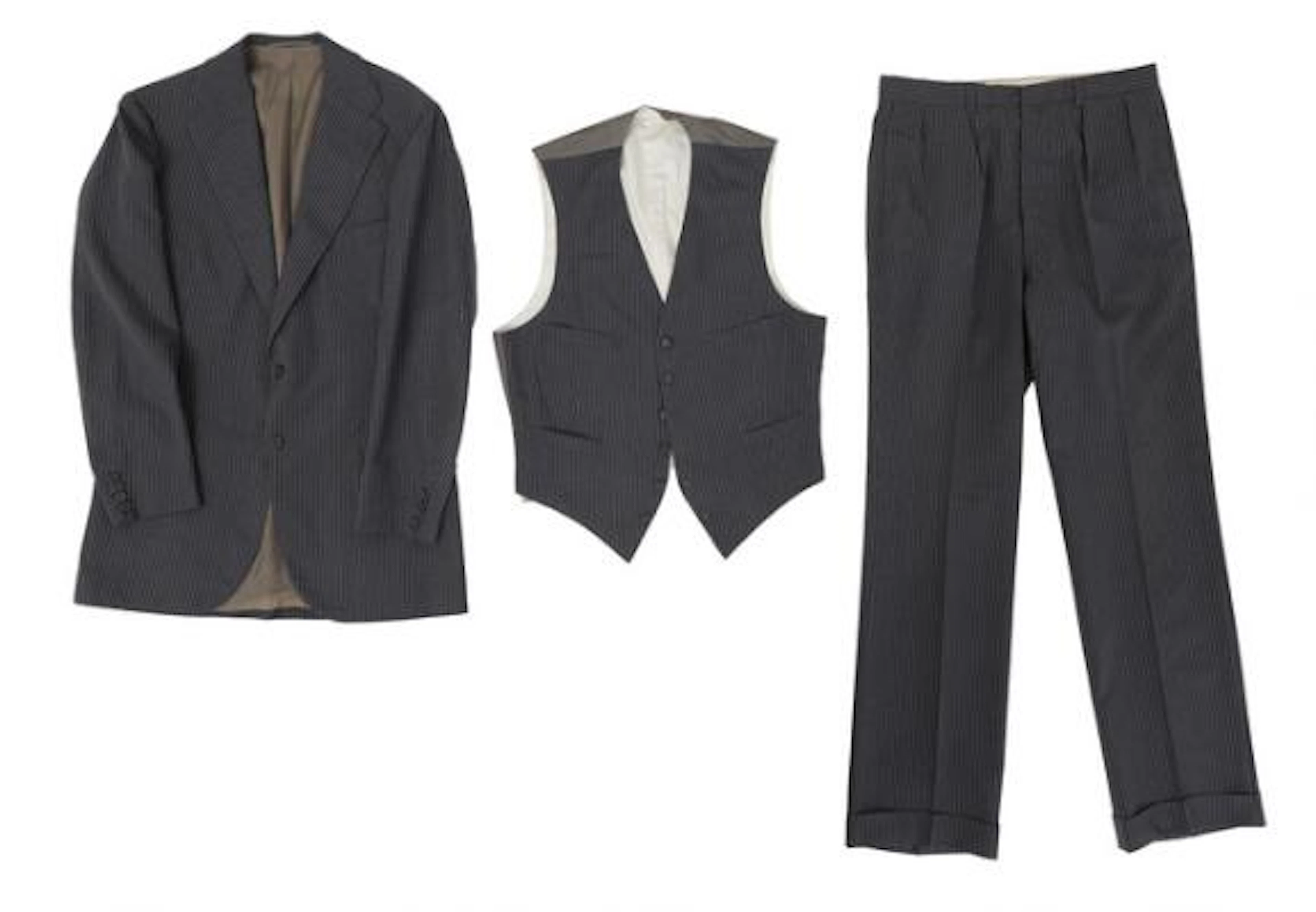 Alfred Alm: A three-piece charcoal grey pinstripe summer suit. 1982.
