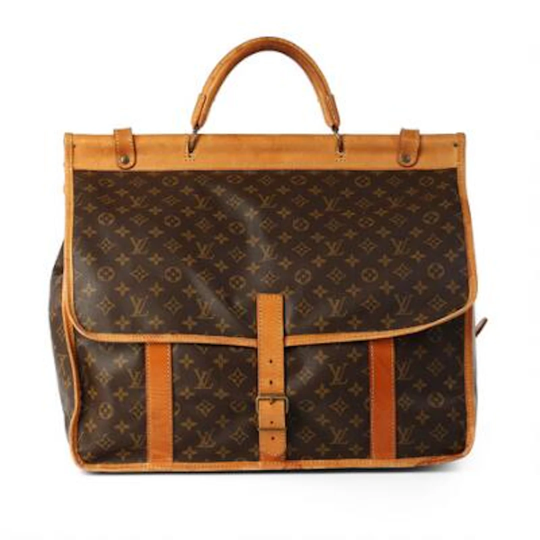 Louis Vuitton: A "Sac Chasse" bag of brown monogram coated canvas