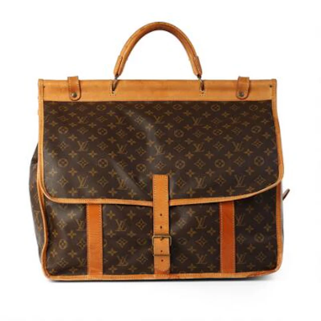 Louis Vuitton: A "Sac Chasse" bag of brown monogram coated canvas