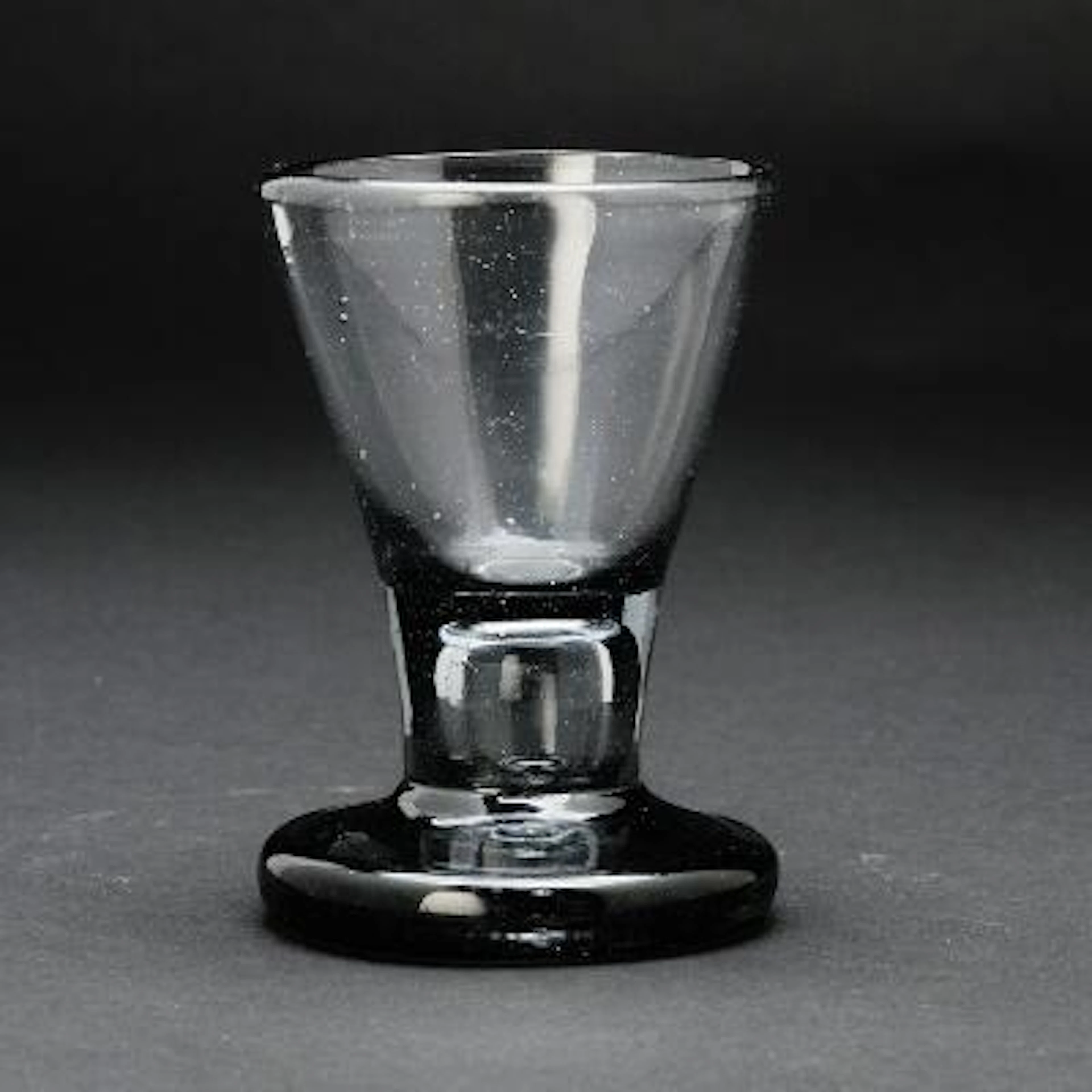 Nøstetangen Freemason grey tinted glass, funnel-shaped cuppa with