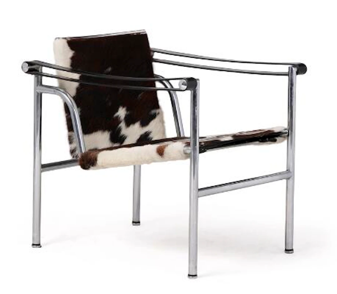 Le Corbusier: "LC 1". Chromed steel armchair with black full grain
