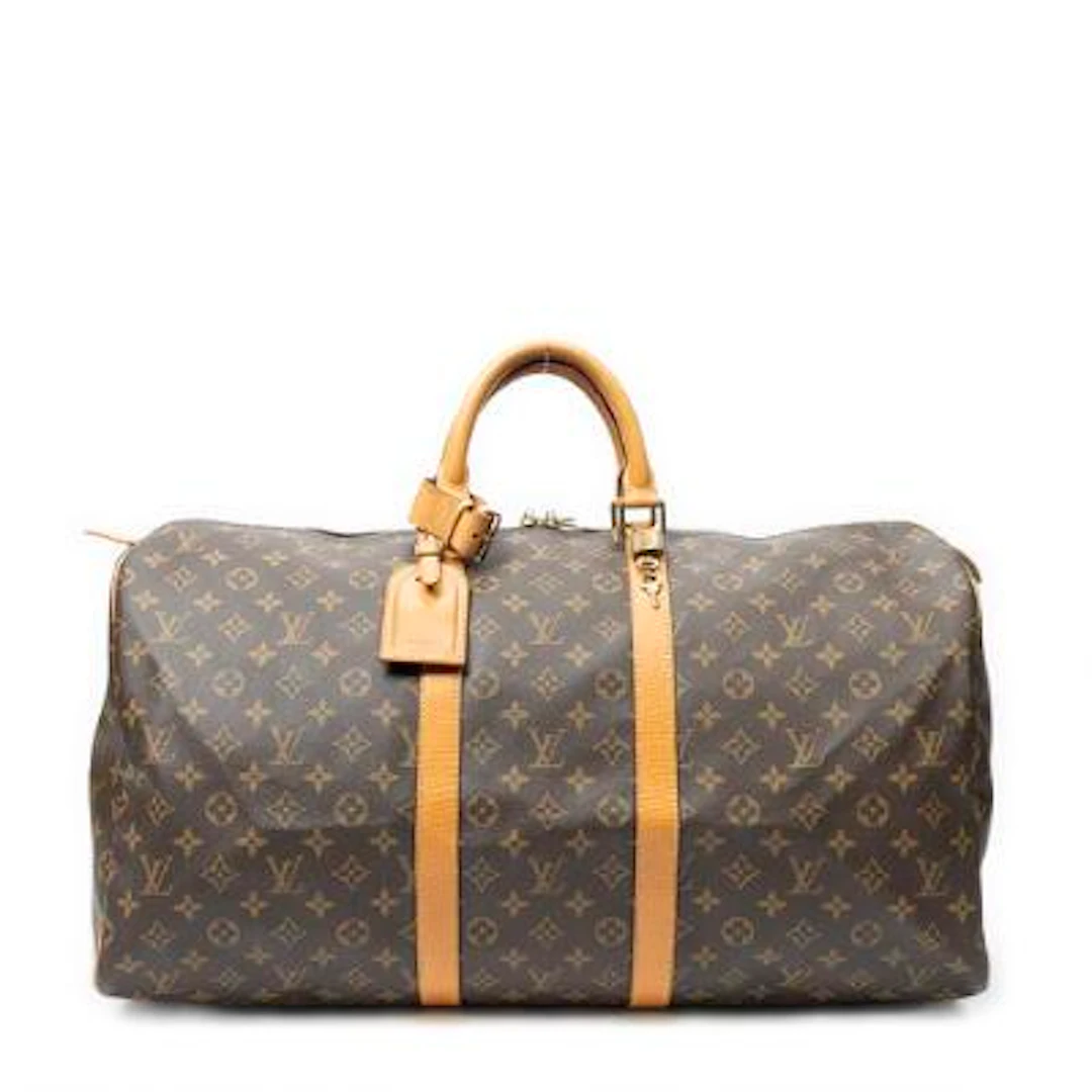 Louis Vuitton: A "Keepall 55" bag in brown monogram coated canvas