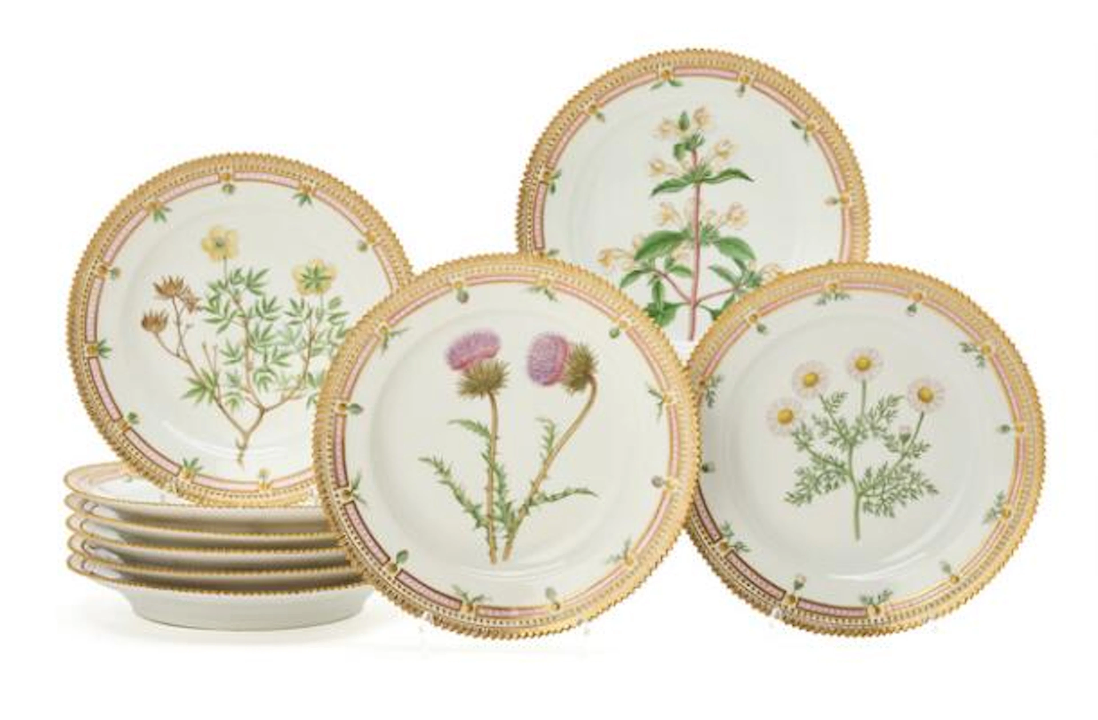 Nine "Flora Danica" enamelled and gilt porcelain lunch plates. Royal