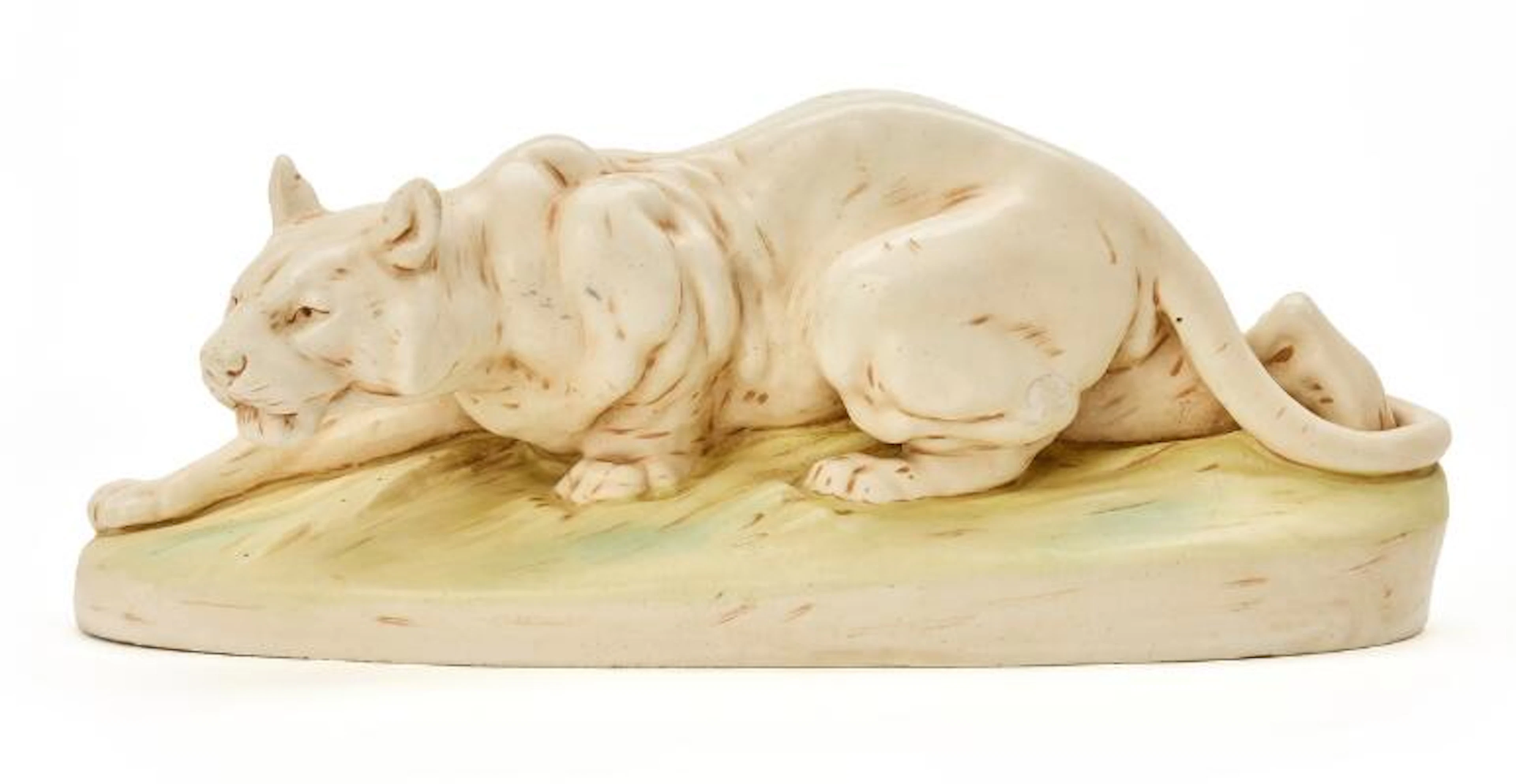 Figure of faience, creeping lioness by Otto Jarl for Royal Dux, Germany.