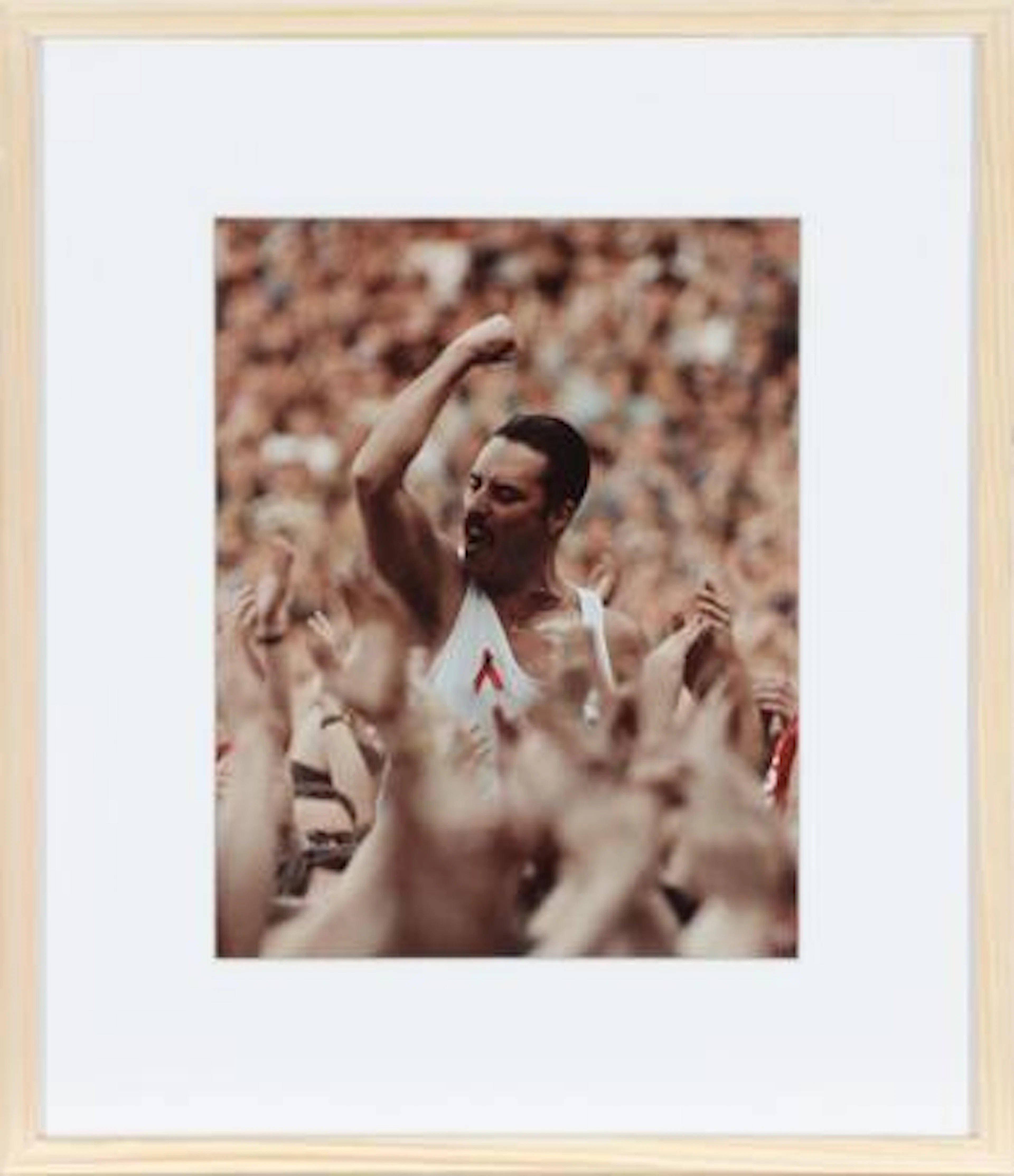 British singer and composer Freddie Mercury (1946–1991) surrounded