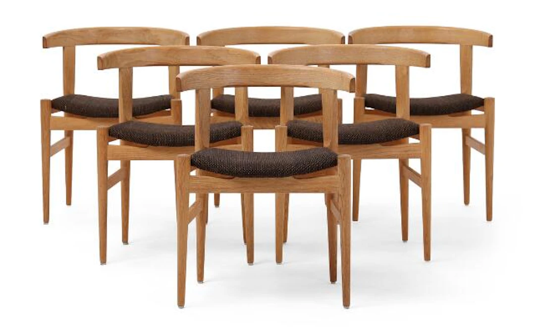 Hans J. Wegner: "CH 21". Set of six rare armchairs in oak. Upholstered