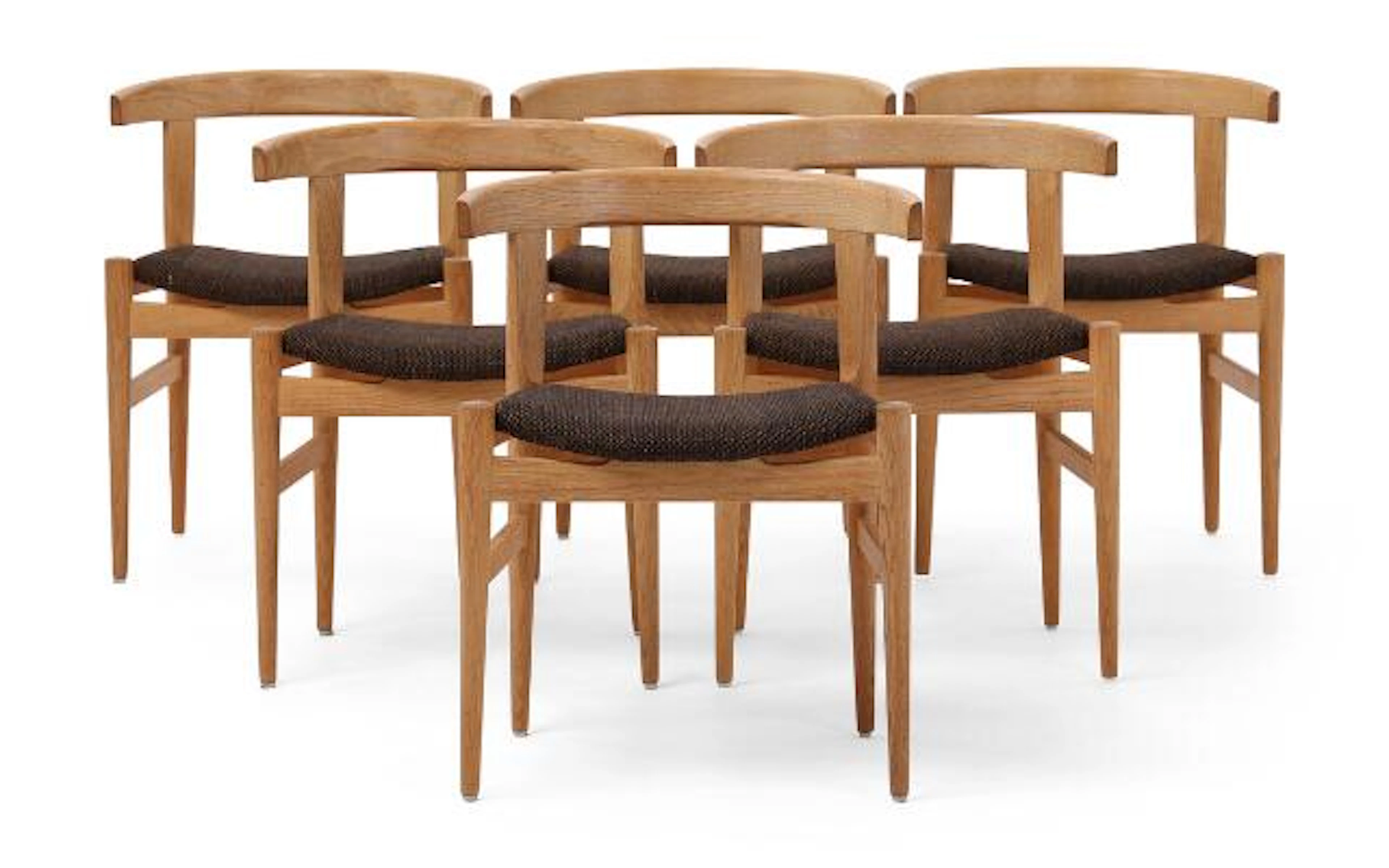 Hans J. Wegner: "CH 21". Set of six rare armchairs in oak. Upholstered