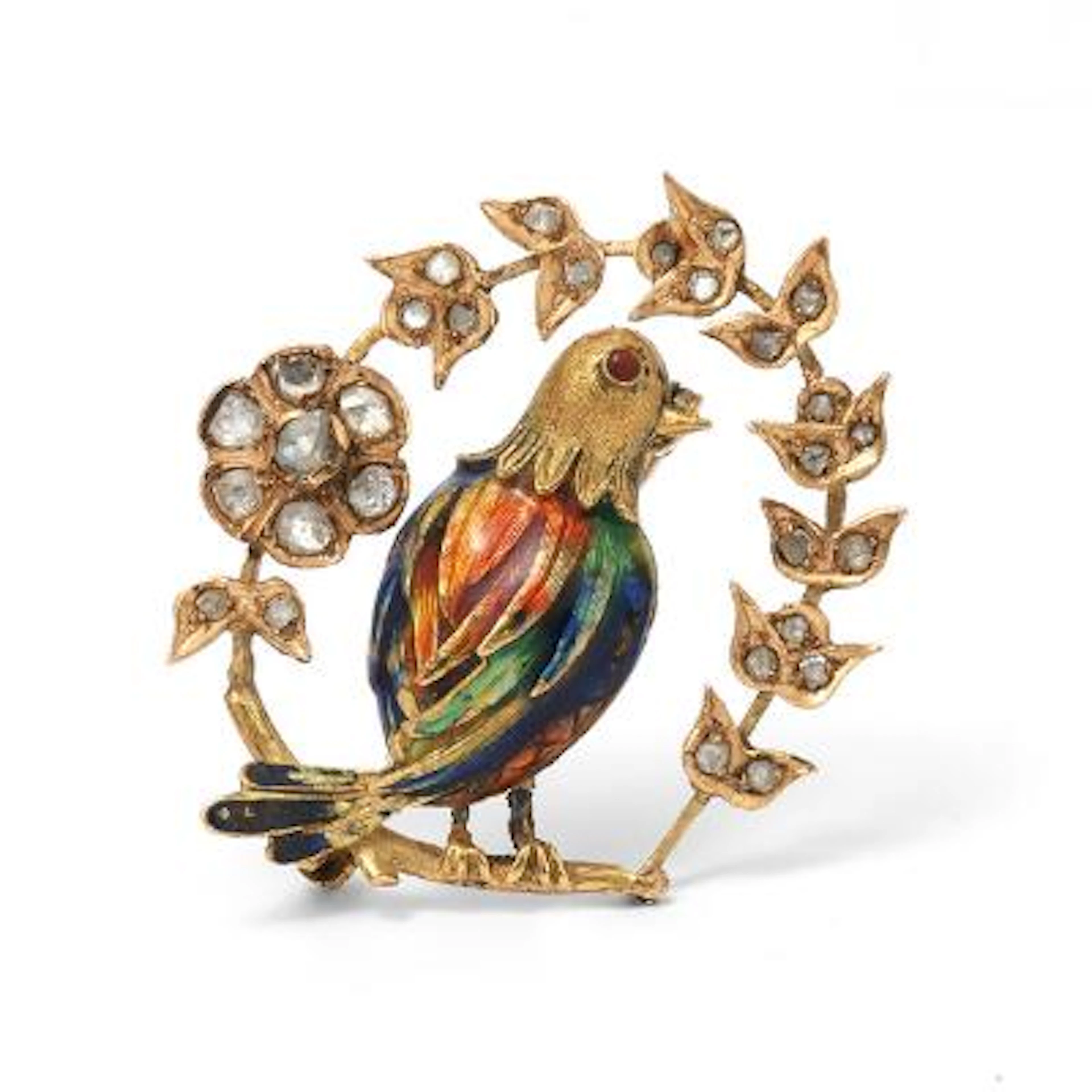 A diamond and enamel brooch in the shape of a bird set with diamonds