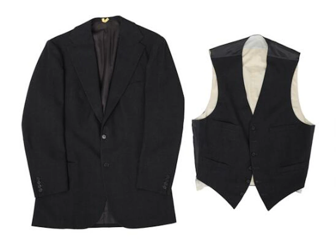 Alfred Alm: A charcoal grey flannel jacket with matching waistcoat.