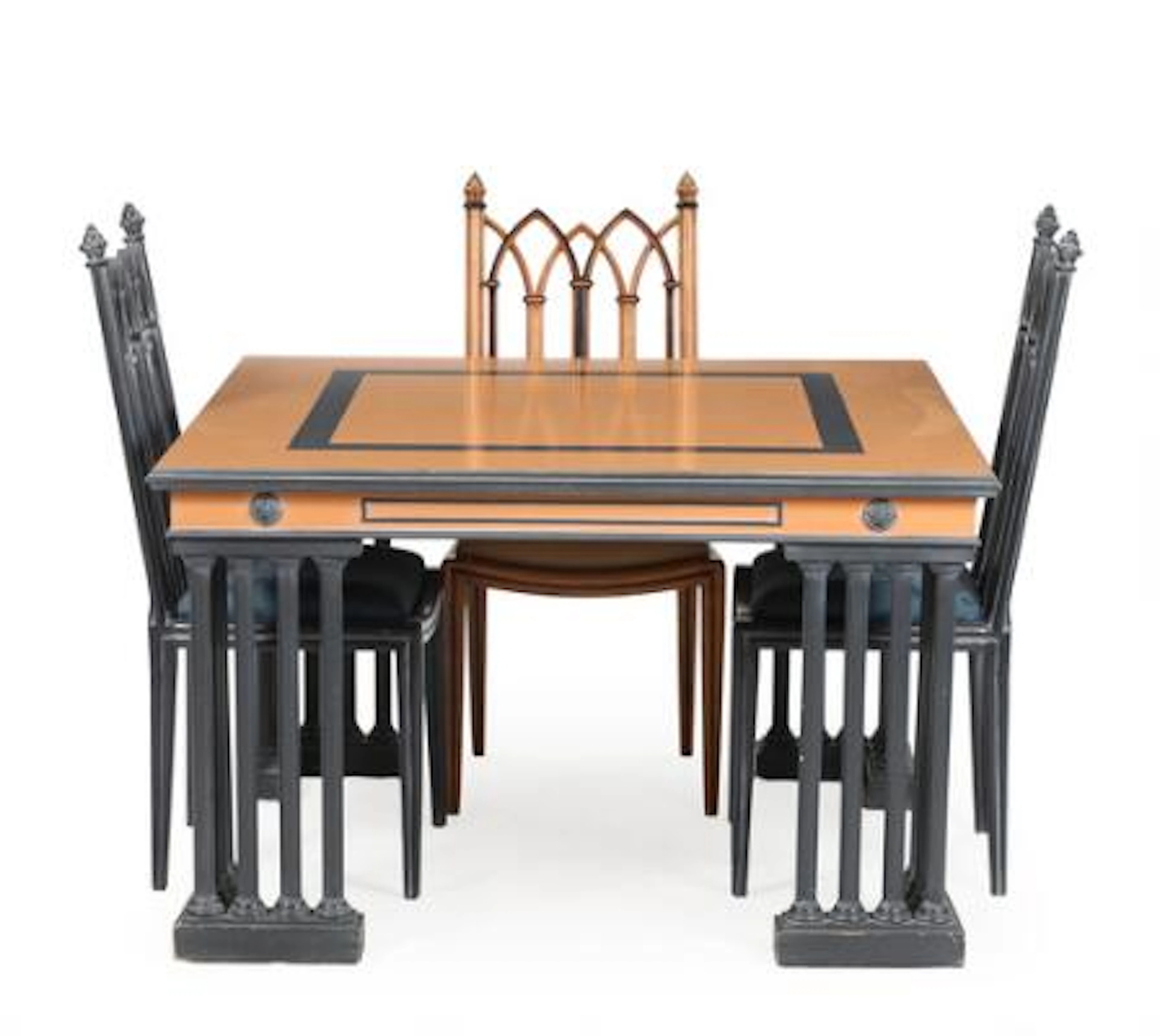 A 20th century partially painted Gothic style dining table and three